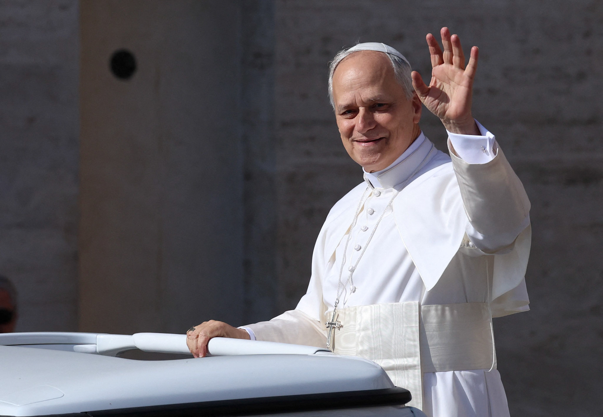 Pope Leo XIV, formerly Cardinal Robert Francis Prevost, waves as he arrives to celebrate his inauguration Mass at the Vatican May 18, 2025. He is the first American pope in history. (OSV News photo/Claudia Greco, Reuters)
