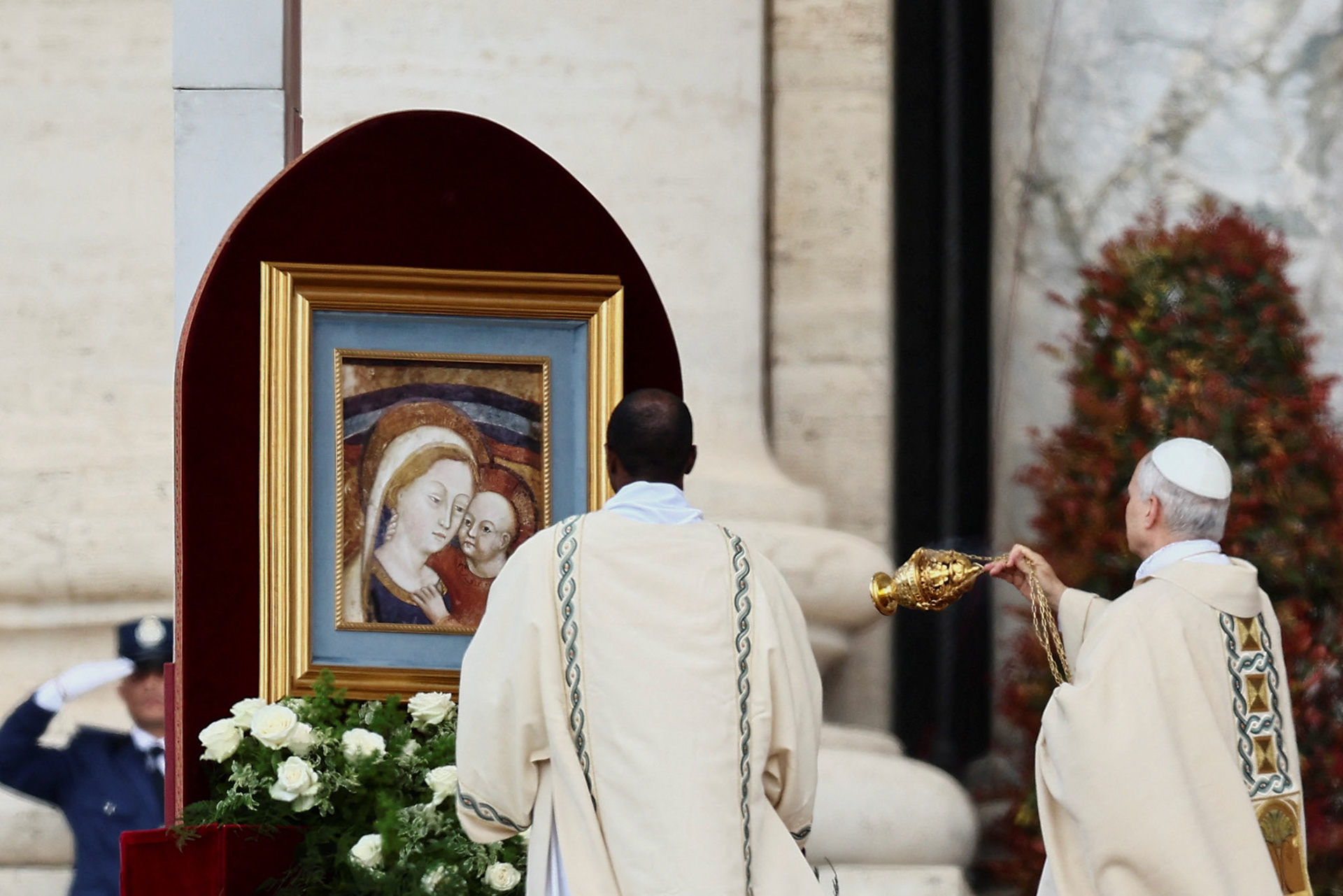 Pope Leo XIV, formerly Cardinal Robert Francis Prevost, swings a censer near a painting of Mary and the Christ Child as he celebrates his inauguration Mass at the Vatican May 18, 2025. He is the first American pope in history. (OSV News photo/Yara Nardi, Reuters)