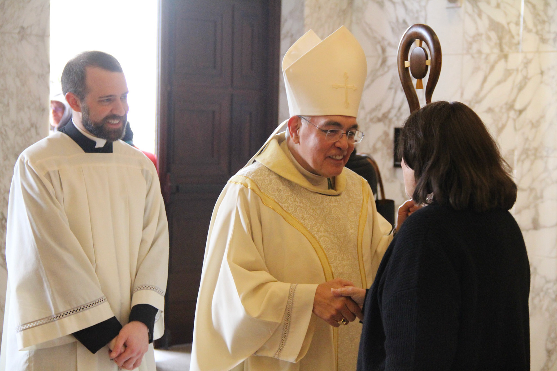 Newly appointed Archbishop Joe S. Vásquez greets a woman after concelebrating a Jan. 20, 2025, Mass at the Co-Cathedral of the Sacred Heart in Houston. Earlier in the day Pope Francis appointed then-Bishop Vásquez, head of the Diocese of Austin, Texas, to succeed Cardinal Daniel N. DiNardo of of Galveston-Houston, 75, who is retiring. (OSV News photo/Jonah Dycus, courtesy Archdiocese of Houston)
