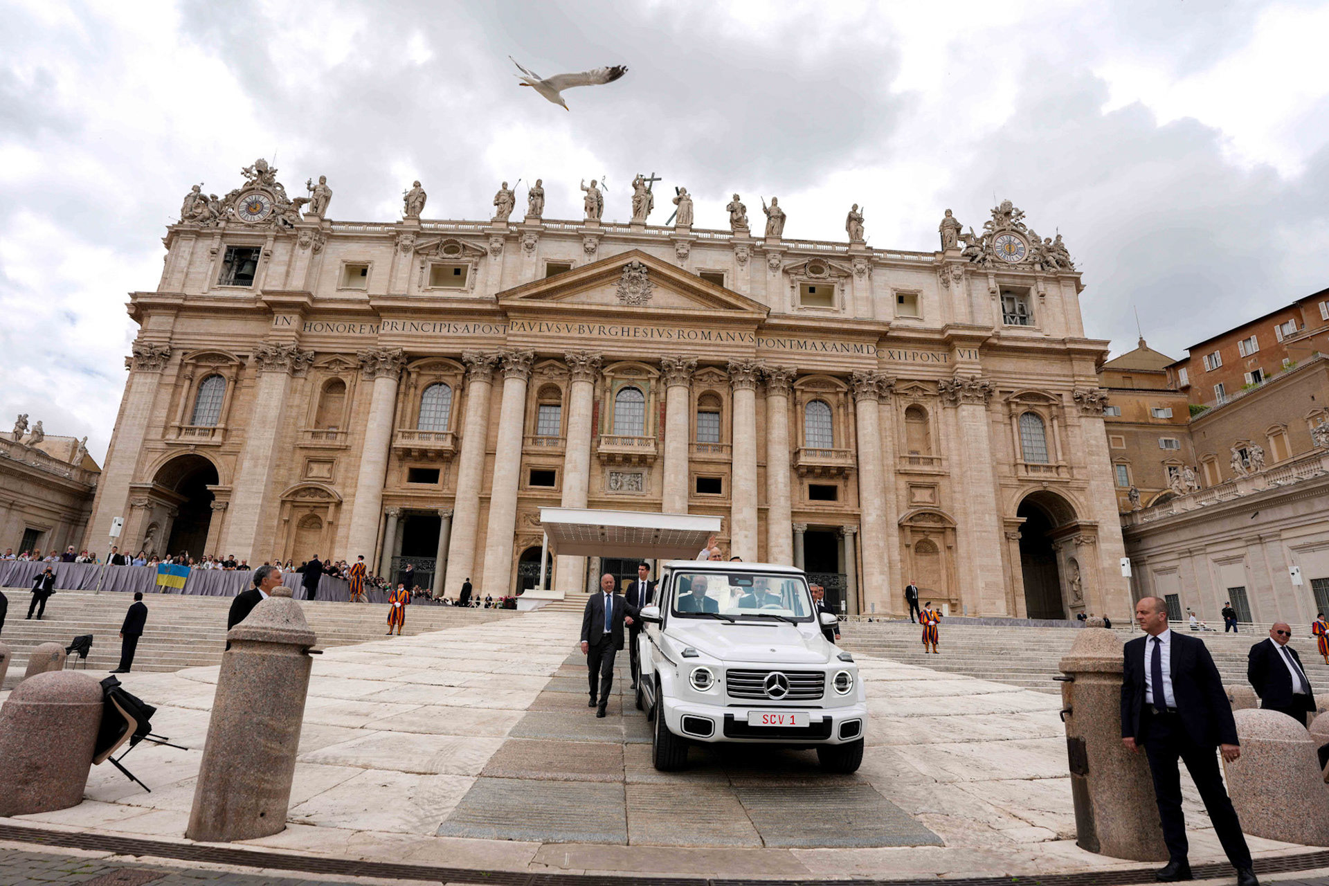 Pope Leo XIV greets visitors as he rides in the popemobile following his first weekly general audience in St. Peter’s Square at the Vatican May 21, 2025. (CNS photo/Lola Gomez)