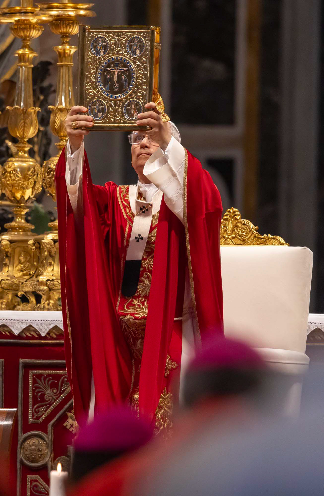 Pope Leo XIV elevates the Book of the Gospels during Mass for the feast of Sts. Peter and Paul in St. Peter’s Basilica at the Vatican June 29, 2025. (CNS photo/Pablo Esparza)