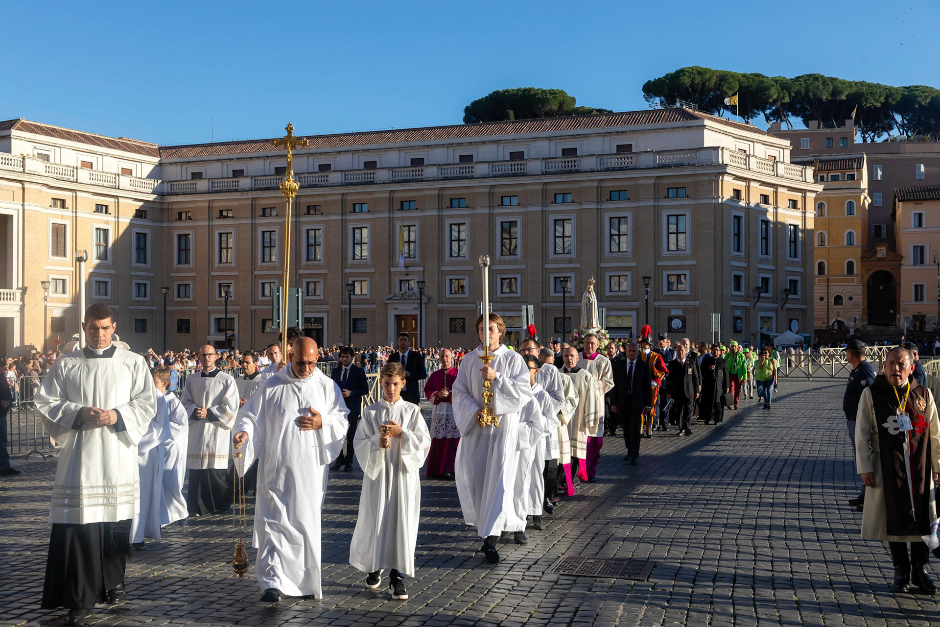 Clergy and pilgrims accompany the original statue of Our Lady of Fatima in procession toward St. Peter’s Square at the Vatican Oct. 11, 2025, for a prayer vigil and recitation of the rosary for peace with Pope Leo XIV. (CNS photo/Pablo Esparza)