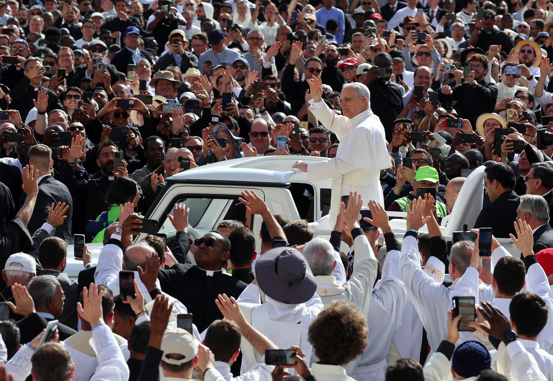 Pope Leo XIV, formerly Cardinal Robert Francis Prevost, waves as he arrives to celebrate his inauguration Mass at the Vatican May 18, 2025. He is the first American pope in history. (OSV News photo/Claudia Greco, Reuters)