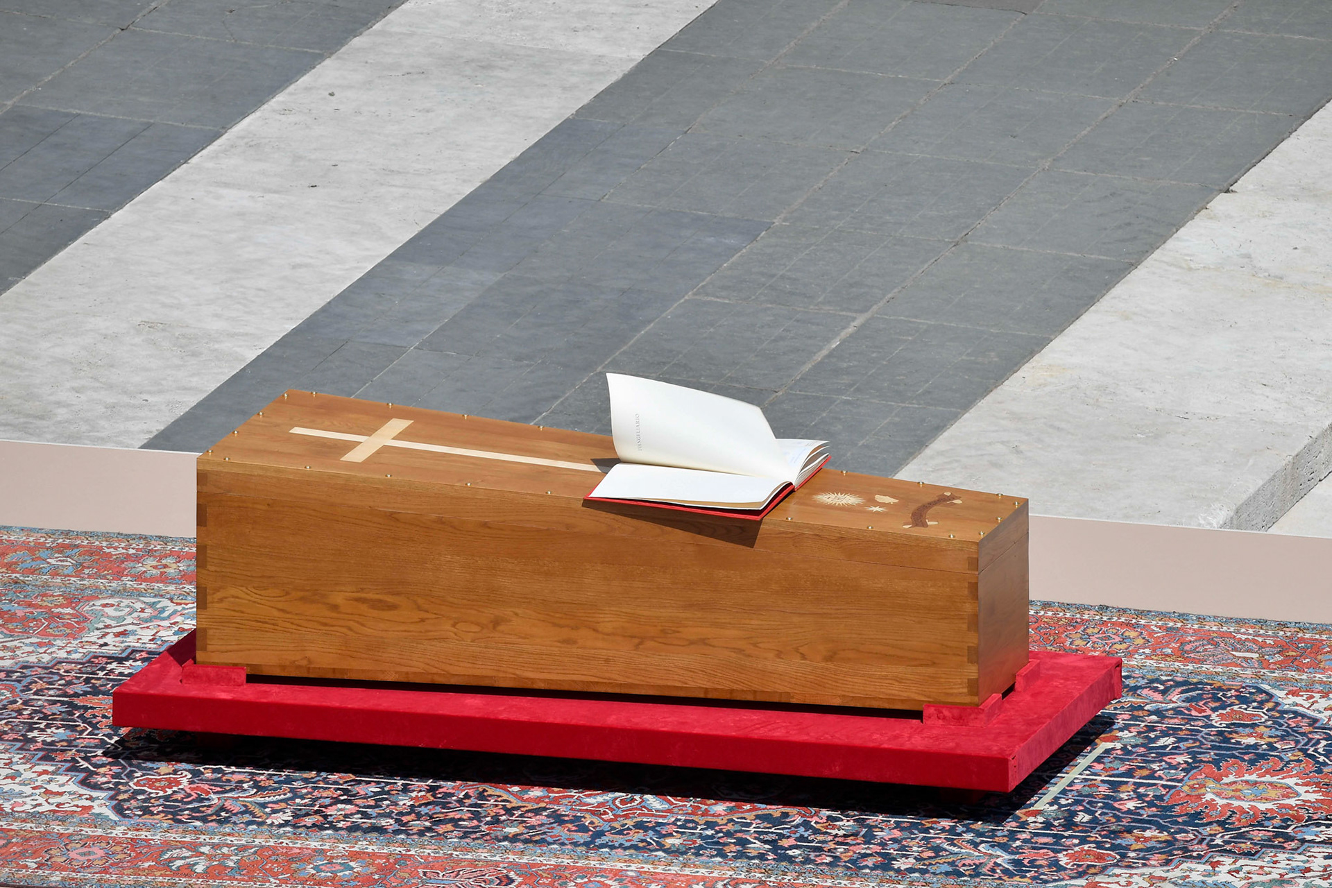 An open Book of the Gospels sits on top of the casket containing the mortal remains of Pope Francis at the beginning of his funeral Mass April 26, 2025, in St. Peter's Square at the Vatican. (OSV News photo/Vatican Media)