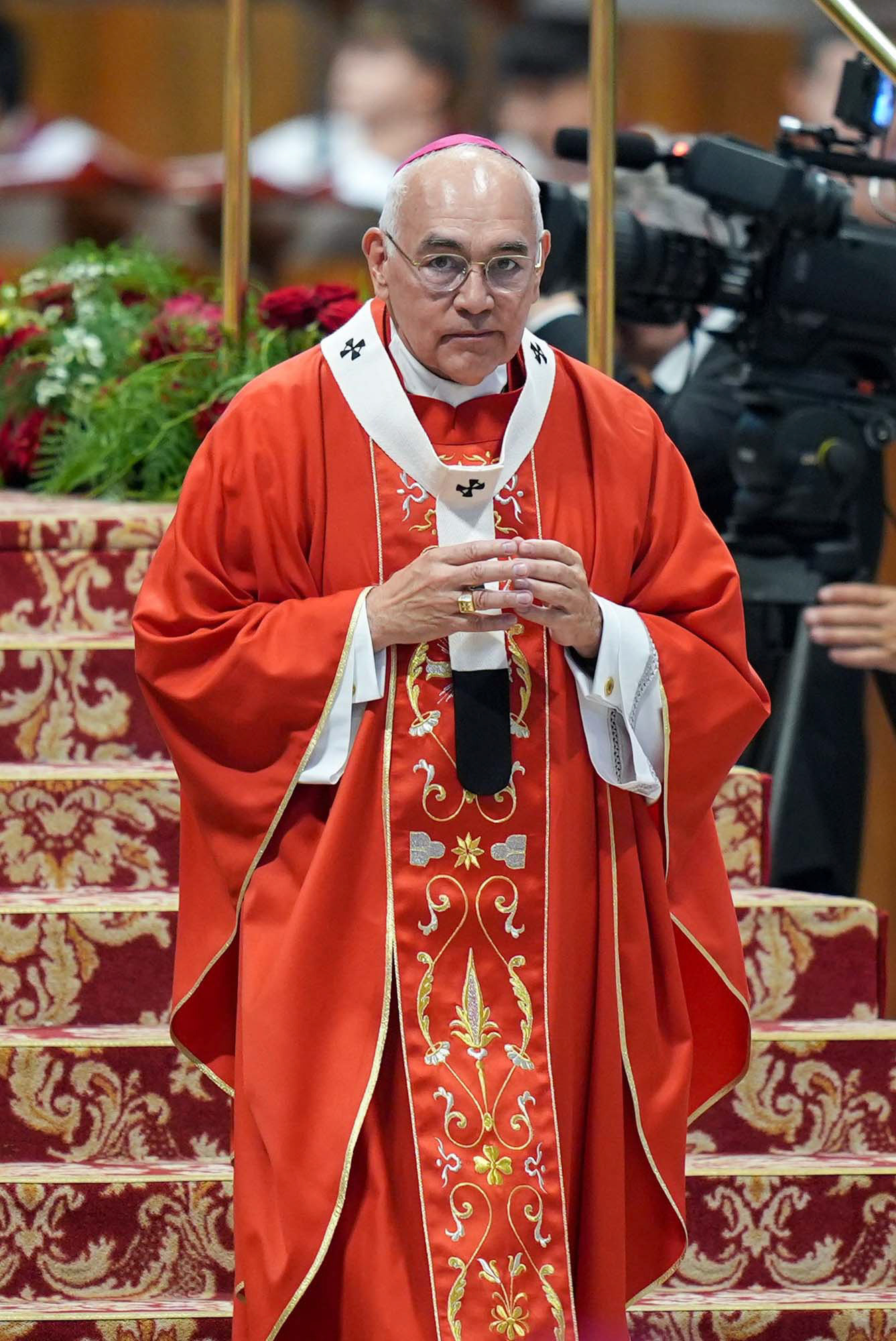 Archbishop Joe S. Vásquez of Galveston-Houston walks back to his seat after receiving the pallium from Pope Leo XIV during Mass in St. Peter’s Basilica at the Vatican June 29, 2025, the feast of Sts. Peter and Paul. The pallium symbolizes the archbishop’s authority and unity with the pope. (CNS photo/Lola Gomez)