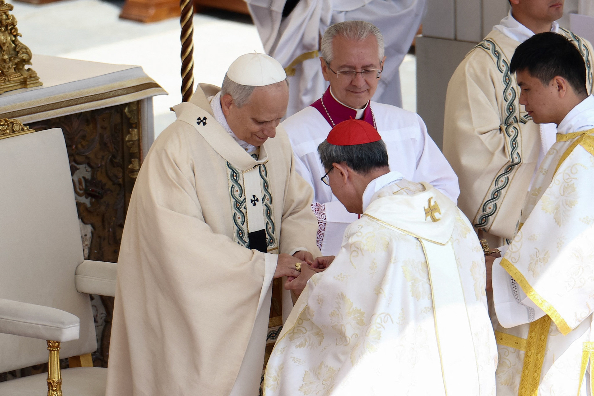 Cardinal Luis Antonio Tagle, pro-prefect of the Dicastery for Evangelization under Pope Francis, places the papal fisherman's ring on Pope Leo XIV, formerly Cardinal Robert Francis Prevost, as the pontiff celebrates his inauguration Mass at the Vatican May 18, 2025. He is the first American pope in history. (OSV News photo/Guglielmo Mangiapane, Reuters)