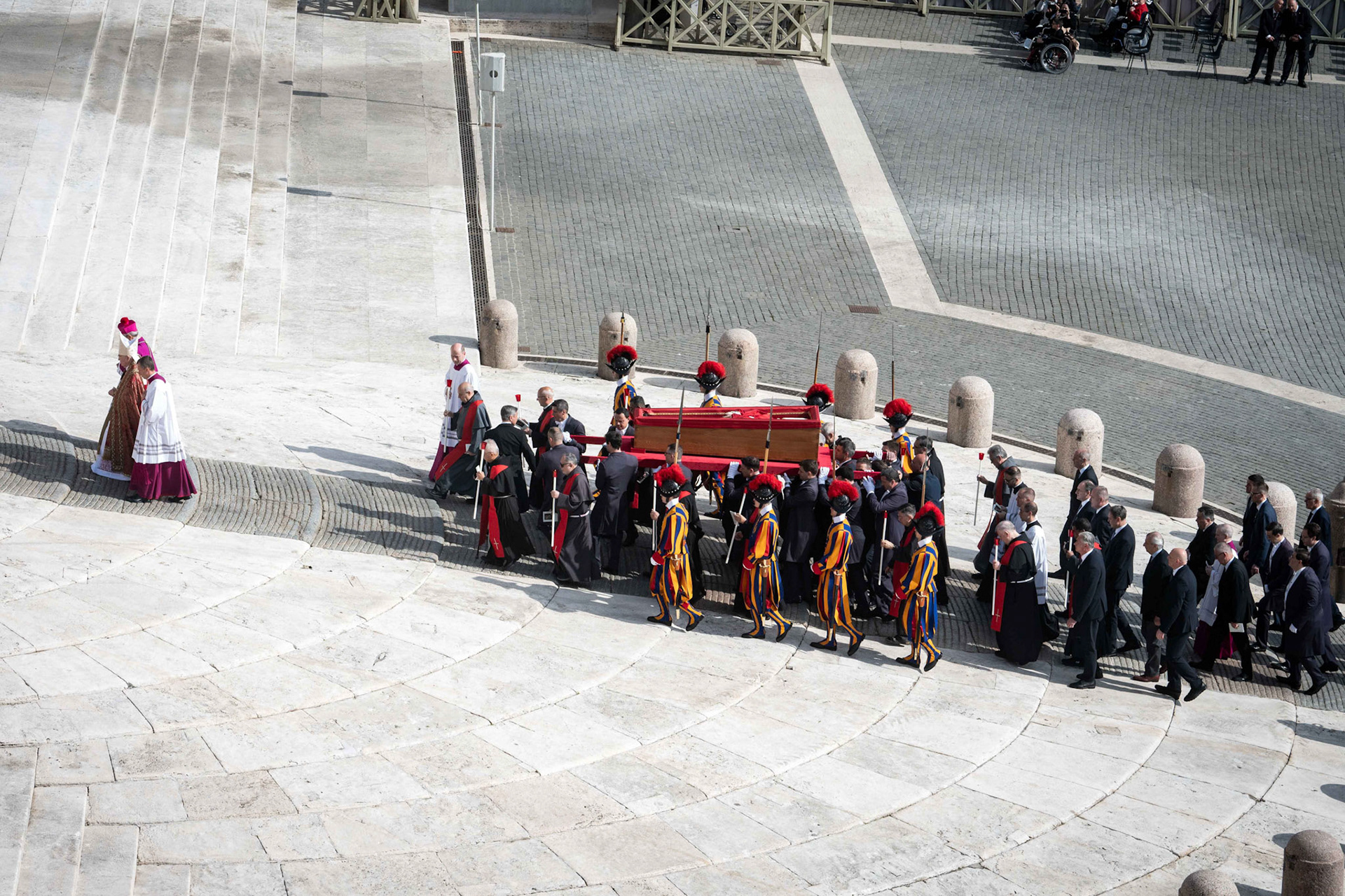 Pallbearers carry the body of Pope Francis in an open casket into St. Peter’s Basilica at the Vatican April 23, 2025, following a procession through St. Peter’s Square. (CNS photo/Cristian Gennari, pool)