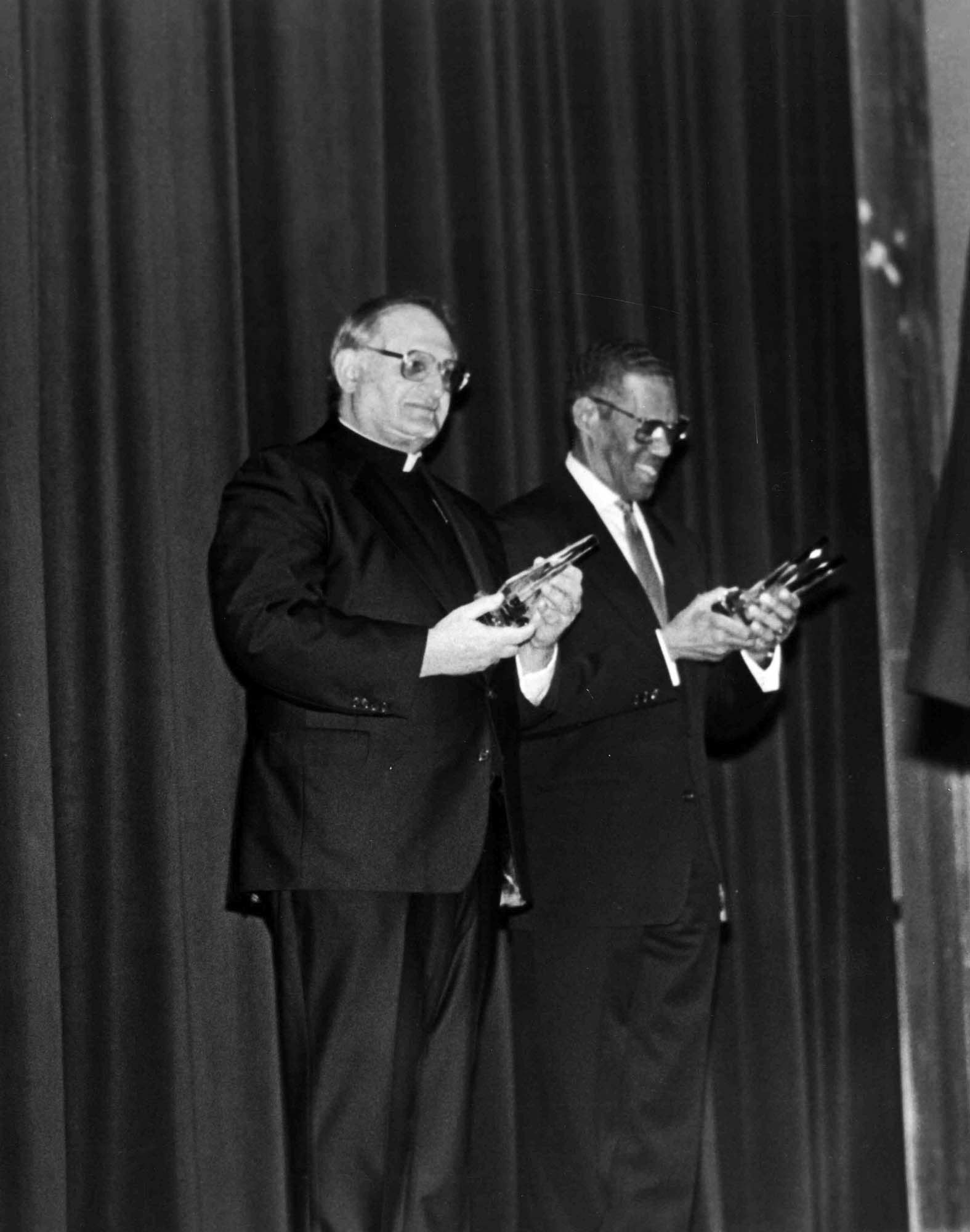 With Rev. Lawson, Archbishop Fiorenza receives the NAACP Unity Award in February 1993.