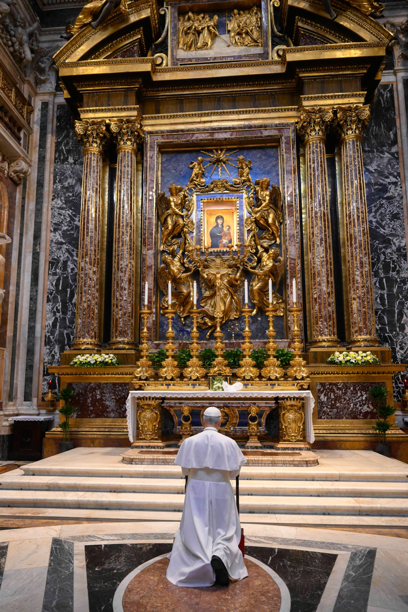 Pope Leo XIV prays before the icon of Mary, "Salus Populi Romani," in the Basilica of St. Mary Major in Rome May 10, 2025. (CNS photo/Vatican Media)