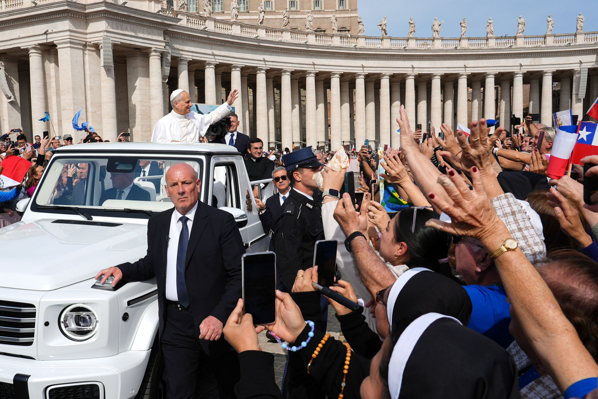 Pope Leo XIV greets people from the popemobile as he rides around St. Peter’s Square after celebrating Mass at the Vatican Oct. 12, 2025, as part of the Jubilee of Marian Spirituality. (CNS photo/Lola Gomez)