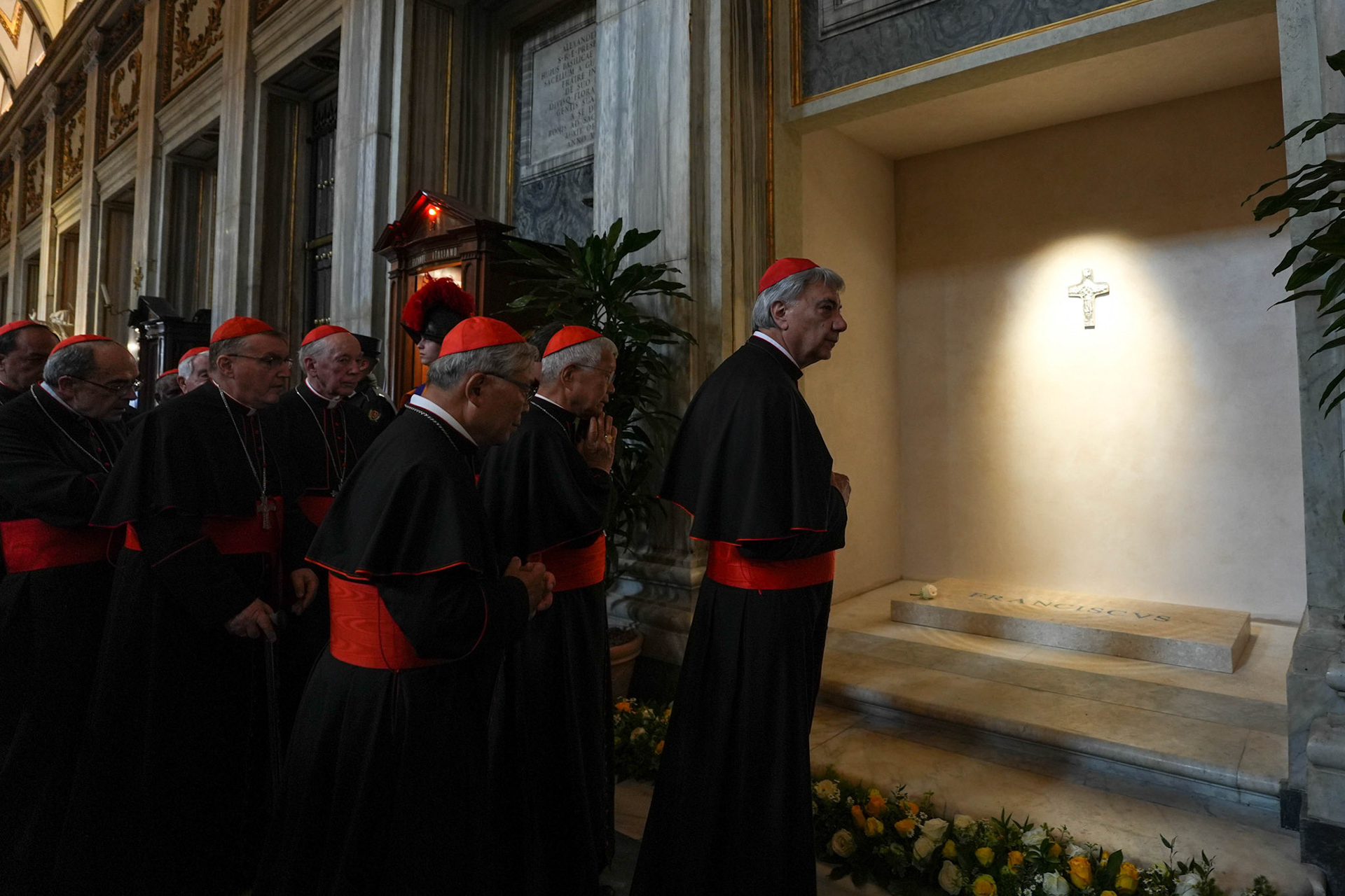 Members of the College of Cardinals pray at the tomb of Pope Francis and attend vespers at the Basilica of St. Mary Major in Rome April 27, 2025. Cardinals and the faithful visited the Marian basilica to offer their prayers and respects. (CNS photo/Lola Gomez)