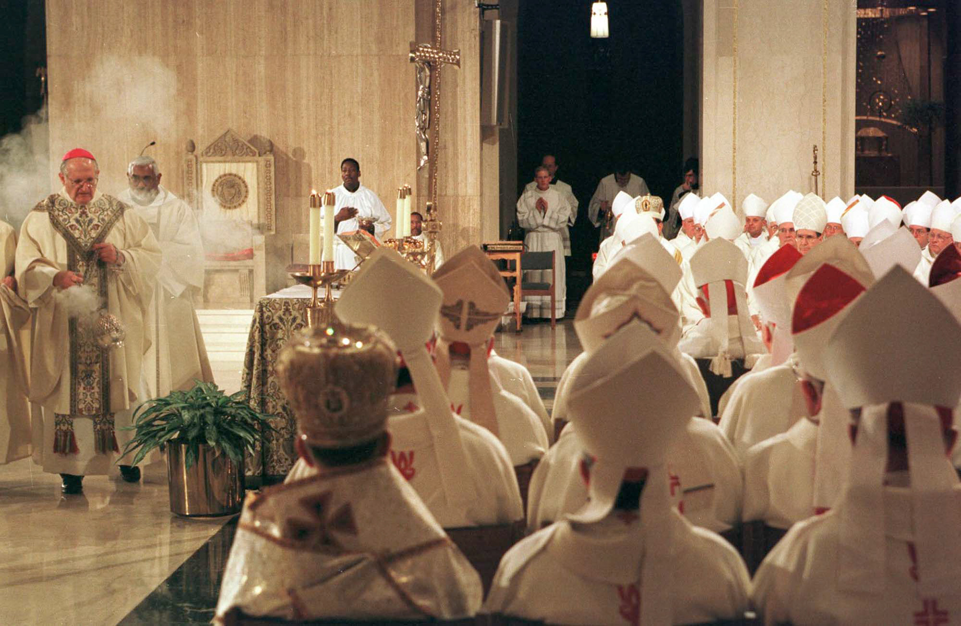 Bishop Joseph Fiorenza, left, leads the celebration of Mass Nov. 13 at the Basilica of the National Shrine of the Immaculate Conception in Washington. (CNS photo by Bob Roller) (Nov. 14, 2000) See BISHOPS-MASS Nov. 14, 2000.