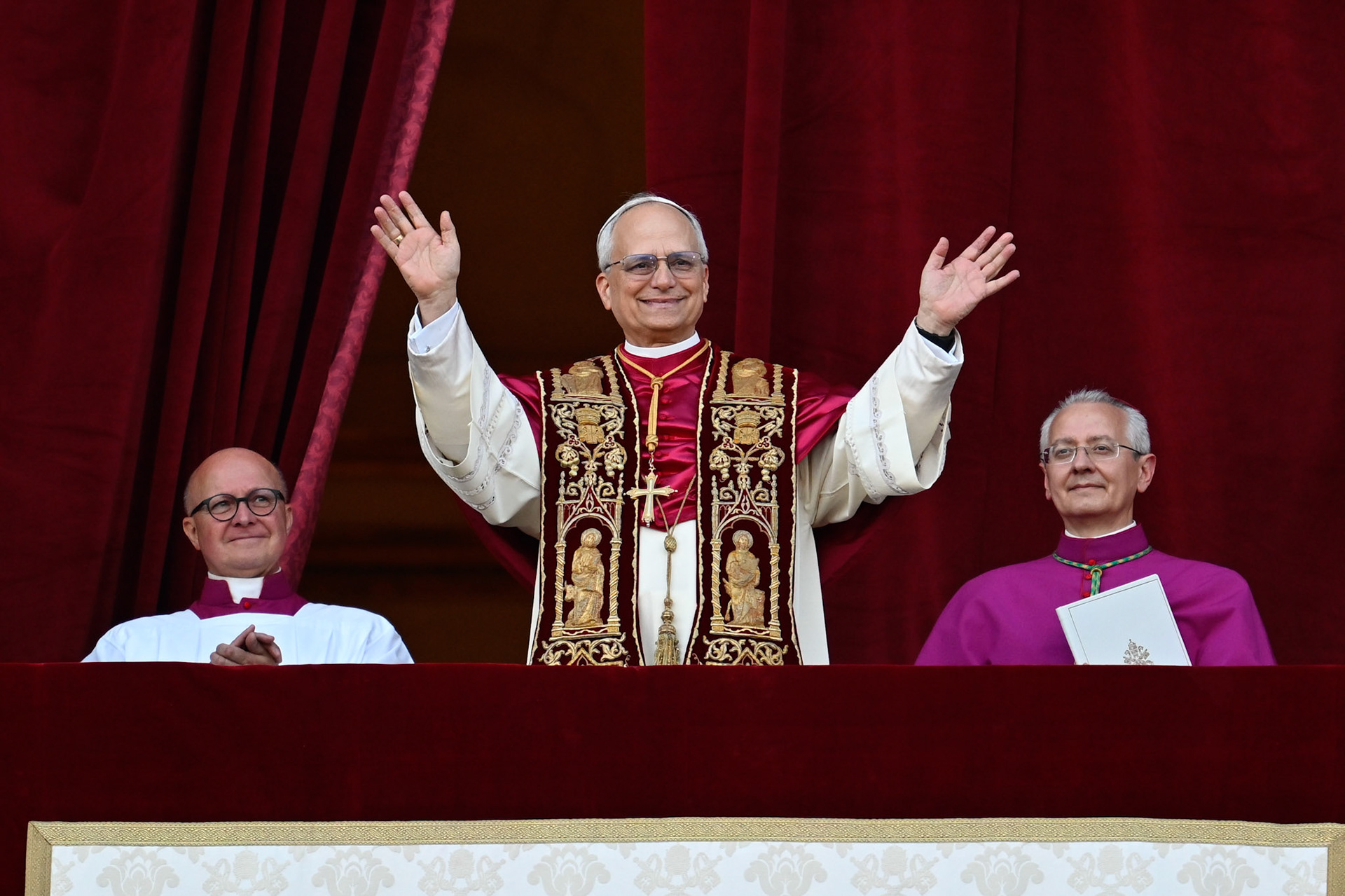 Pope Leo XIV, the former Cardinal Robert F. Prevost, waves to the crowds in St. Peter's Square at the Vatican after his election as pope May 8, 2025. The new pope was born in Chicago. (CNS photo/Vatican Media)