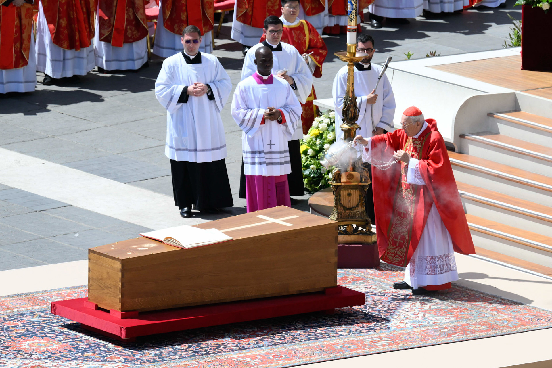 Cardinal Giovanni Battista Re, dean of the College of Cardinals, blesses the coffin as he leads the funeral Mass of Pope Francis in St. Peter's Square at the Vatican April 26, 2025. (OSV News photo/Vatican Media)