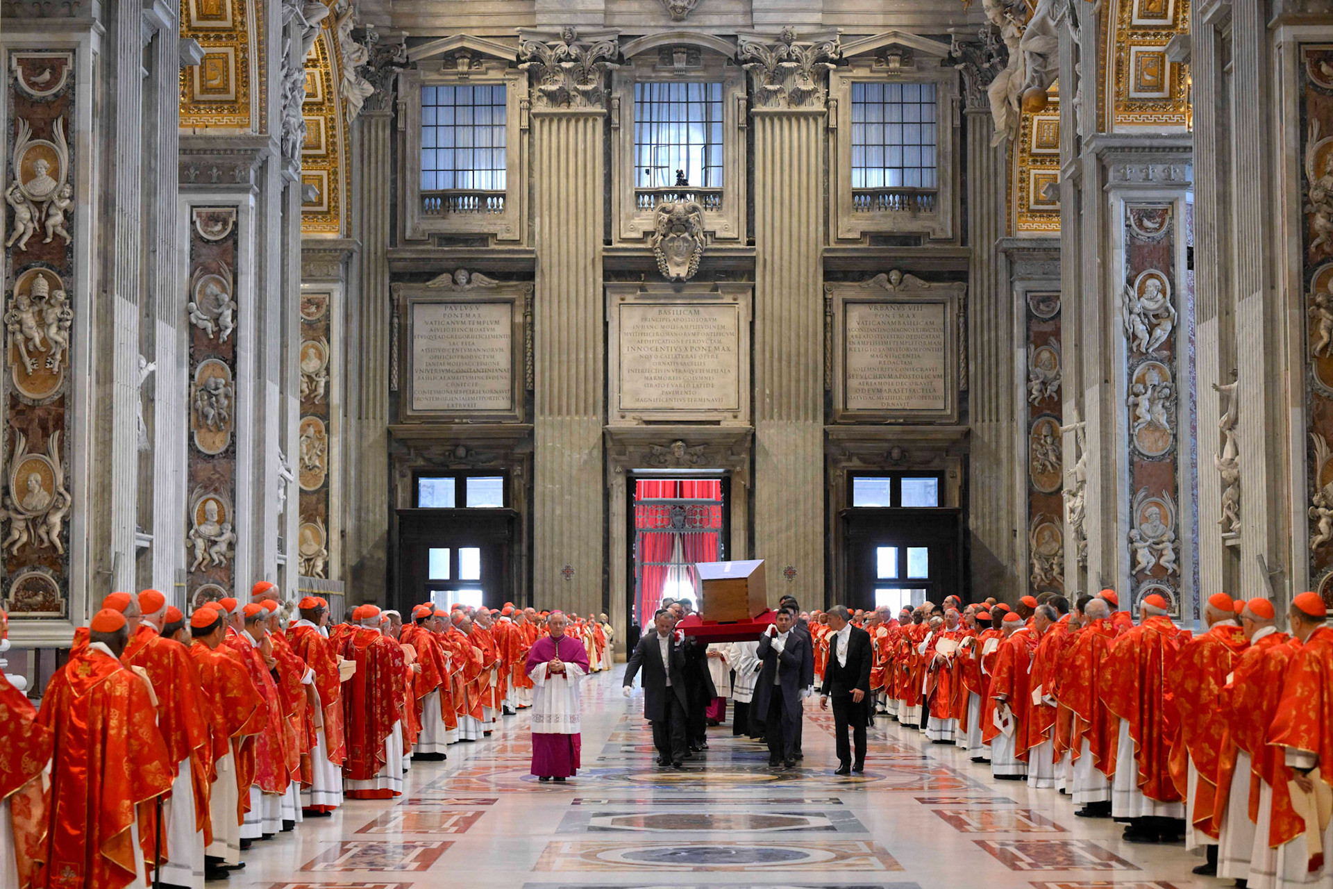 Cardinals line the aisle as pallbearers carry the casket of Pope Francis into St. Peter's Basilica at the conclusion of his funeral Mass in St. Peter's Square at the Vatican April 26, 2025. (OSV News photo/Vatican Media)