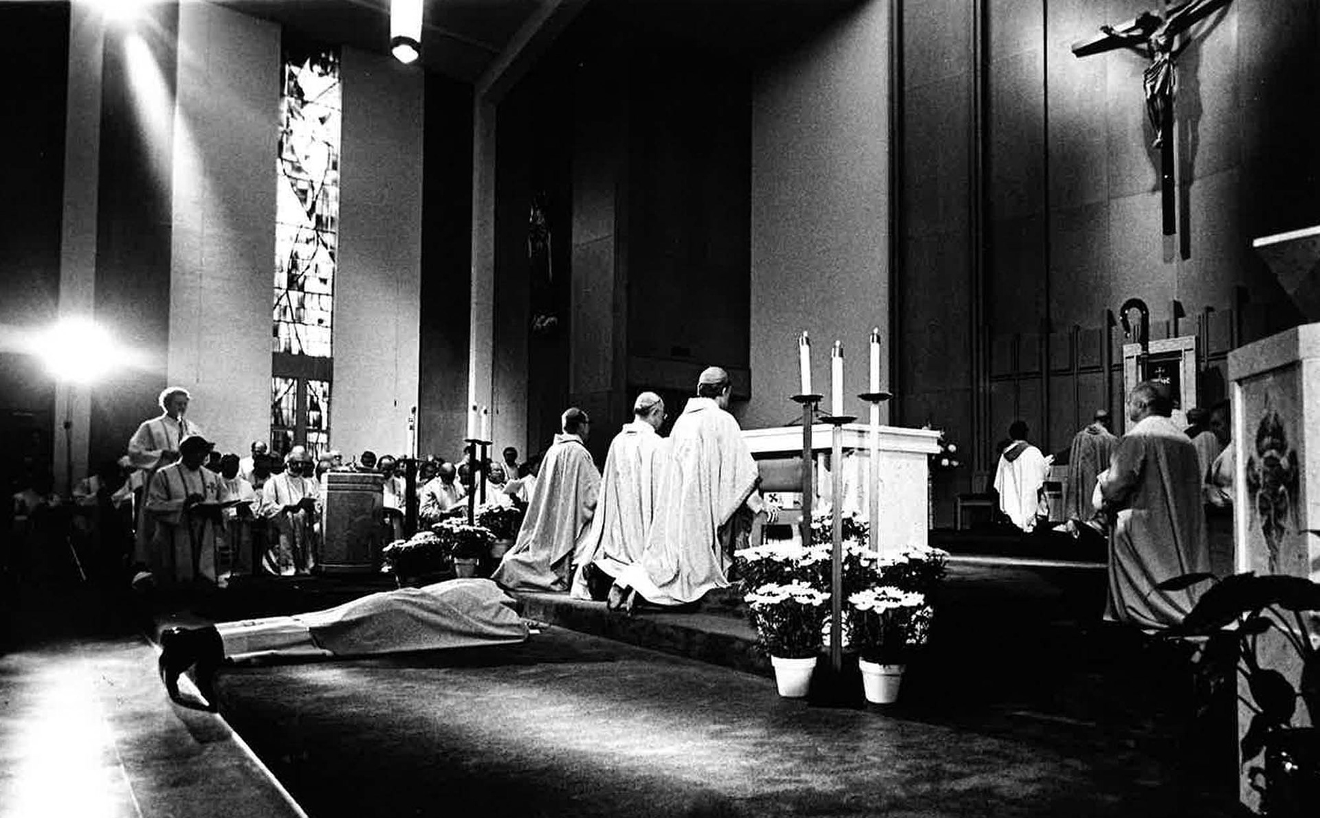 Bishop Fiorenza lays prostrate on the ground during his episcopal ordination as bishop of San Angelo