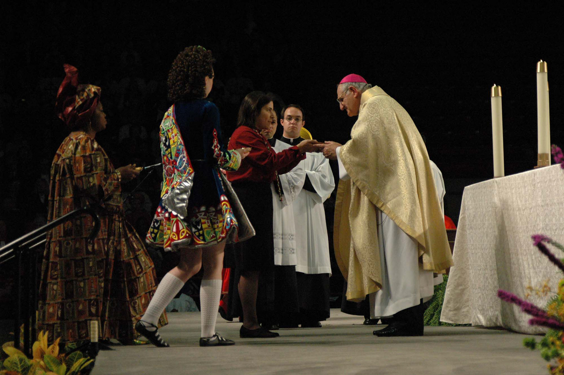 Archbishop Fiorenza receives the offertory during an anniversary Mass honoring his priestly ordination in November of 2004.
