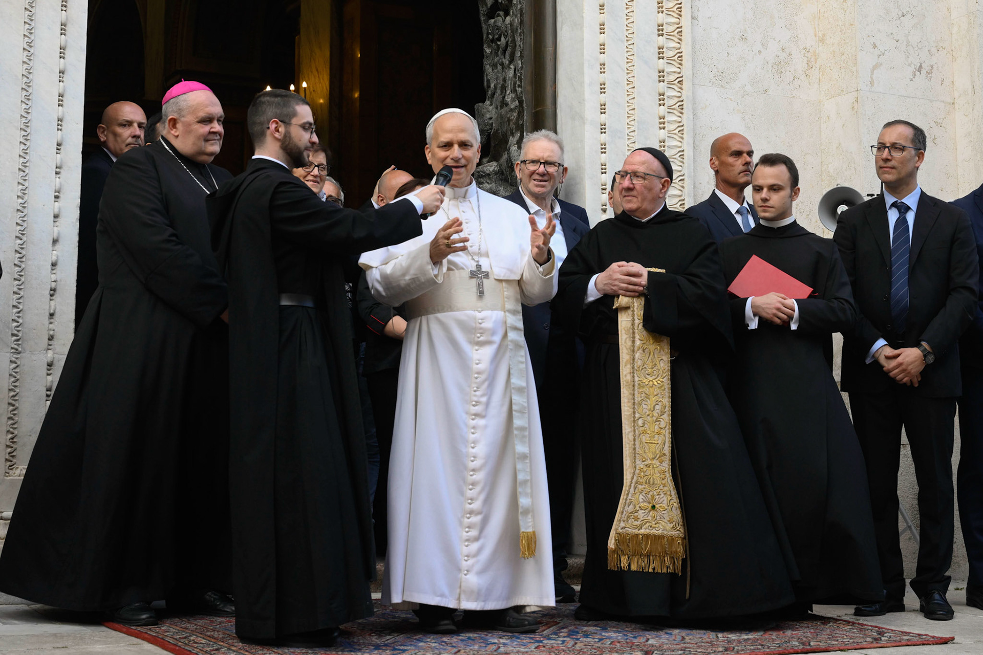 Pope Leo XIV greets a crowd outside the Shrine of Our Lady of Good Counsel in Genazzano, Italy, southeast of Rome, May 10, 2025. The shrine, with a famous image of Mary, is run by the pope's Augustinian confreres. (CNS photo/Vatican Media)