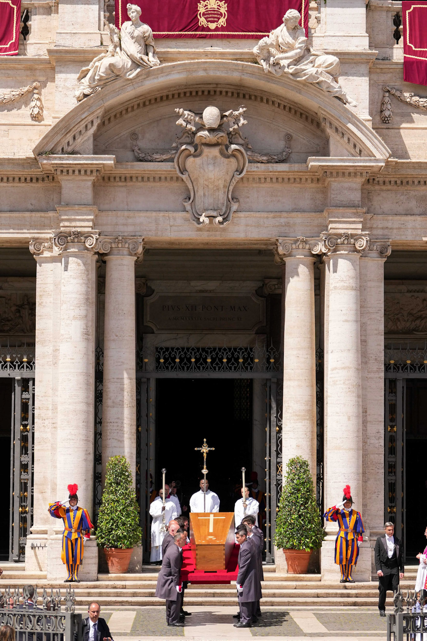 Pallbearers carry the casket of Pope Francis into the Basilica of St. Mary Major in Rome April 26, 2025, ahead of his burial. The pope requested to be buried in the Marian basilica following his funeral Mass at the Vatican. (CNS photo/Lola Gomez)