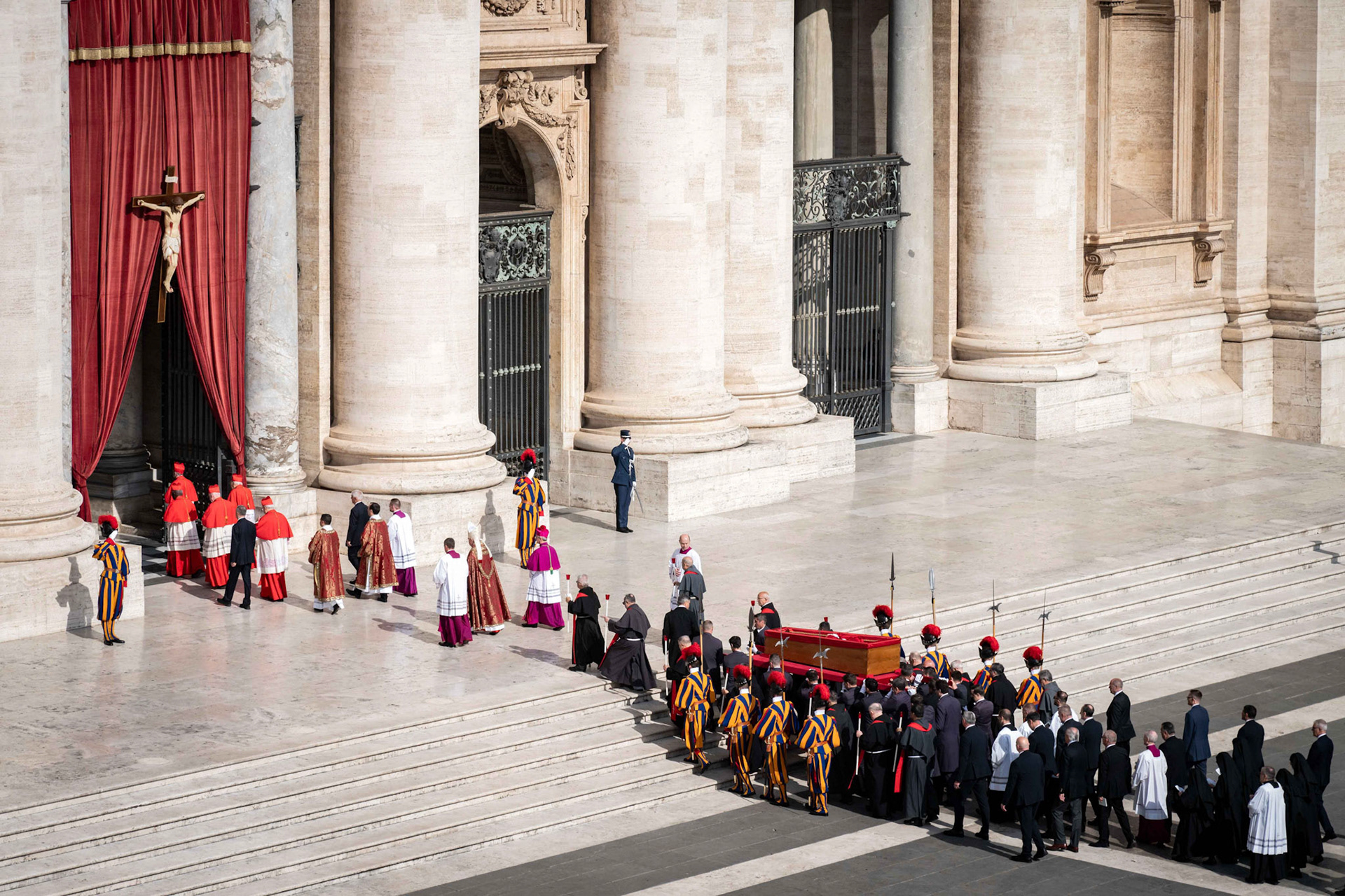 Pallbearers carry the body of Pope Francis in an open casket into St. Peter’s Basilica at the Vatican April 23, 2025, following a procession through St. Peter’s Square. (CNS photo/Cristian Gennari, pool)