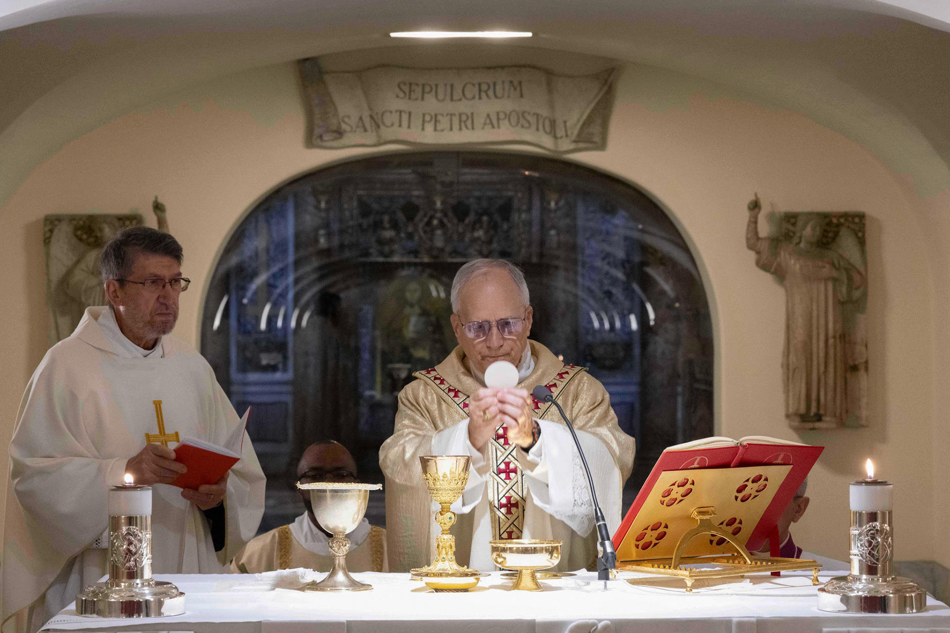 Pope Leo XIV celebrates Mass May 11, 2025, at the altar near the tomb of St. Peter's in the grotto of St. Peter's Basilica at the Vatican. Father Alejandro Moral Anton, prior general of the Order of St. Augustine, was the principal concelebrant. (CNS photo/Vatican Media)