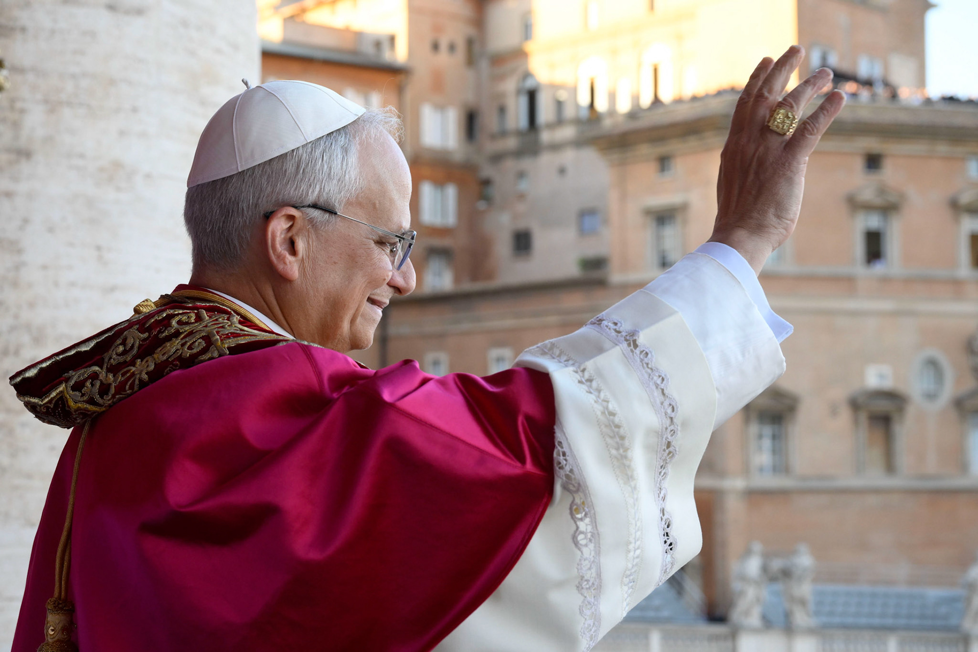 Pope Leo XIV, the former Cardinal Robert F. Prevost, waves to the crowds in St. Peter's Square at the Vatican after his election as pope May 8, 2025. The new pope was born in Chicago. (CNS photo/Vatican Media)