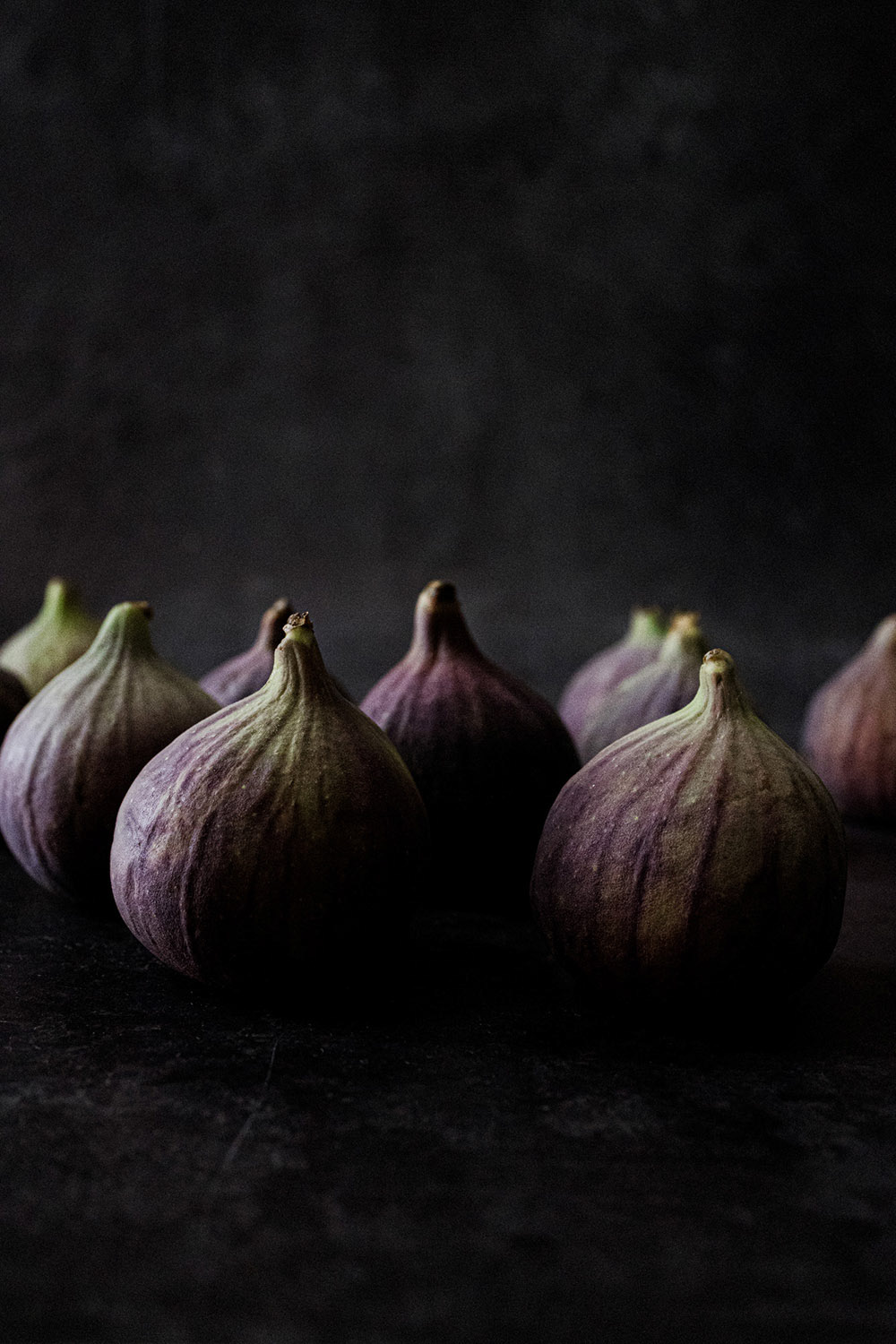 Close up of figs, moody, dark atmosphere.