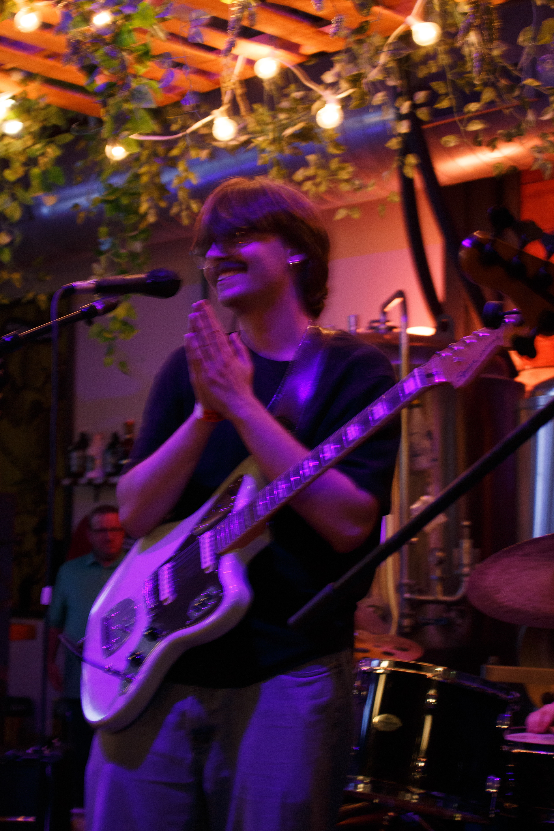 Bruno Philippon grins and thanks his audience as they applaud him at the conclusion of his first show at Craft and Growler in Dallas, Texas on March 22, 2024. Photo/ Natalie VanDerWal