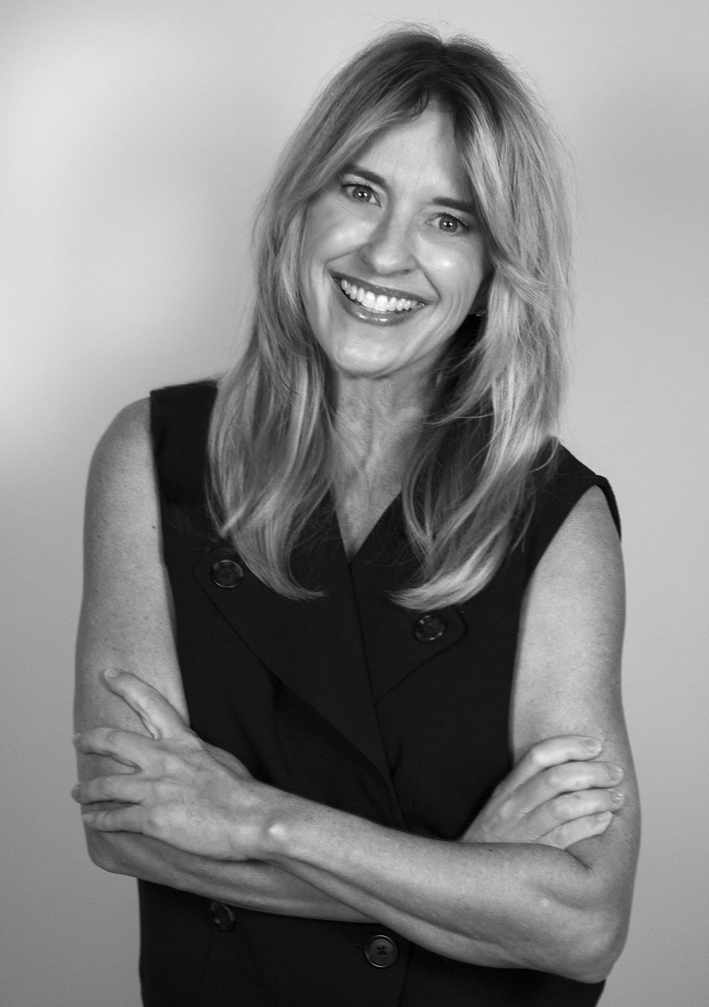 DALLAS, TEXAS July 10, 2025 Jennifer Hayes, Managing Editor of Special Sections at D Magazine, poses for her updated company headshot on July 10, 2025. Photo/ Natalie VanDerWal