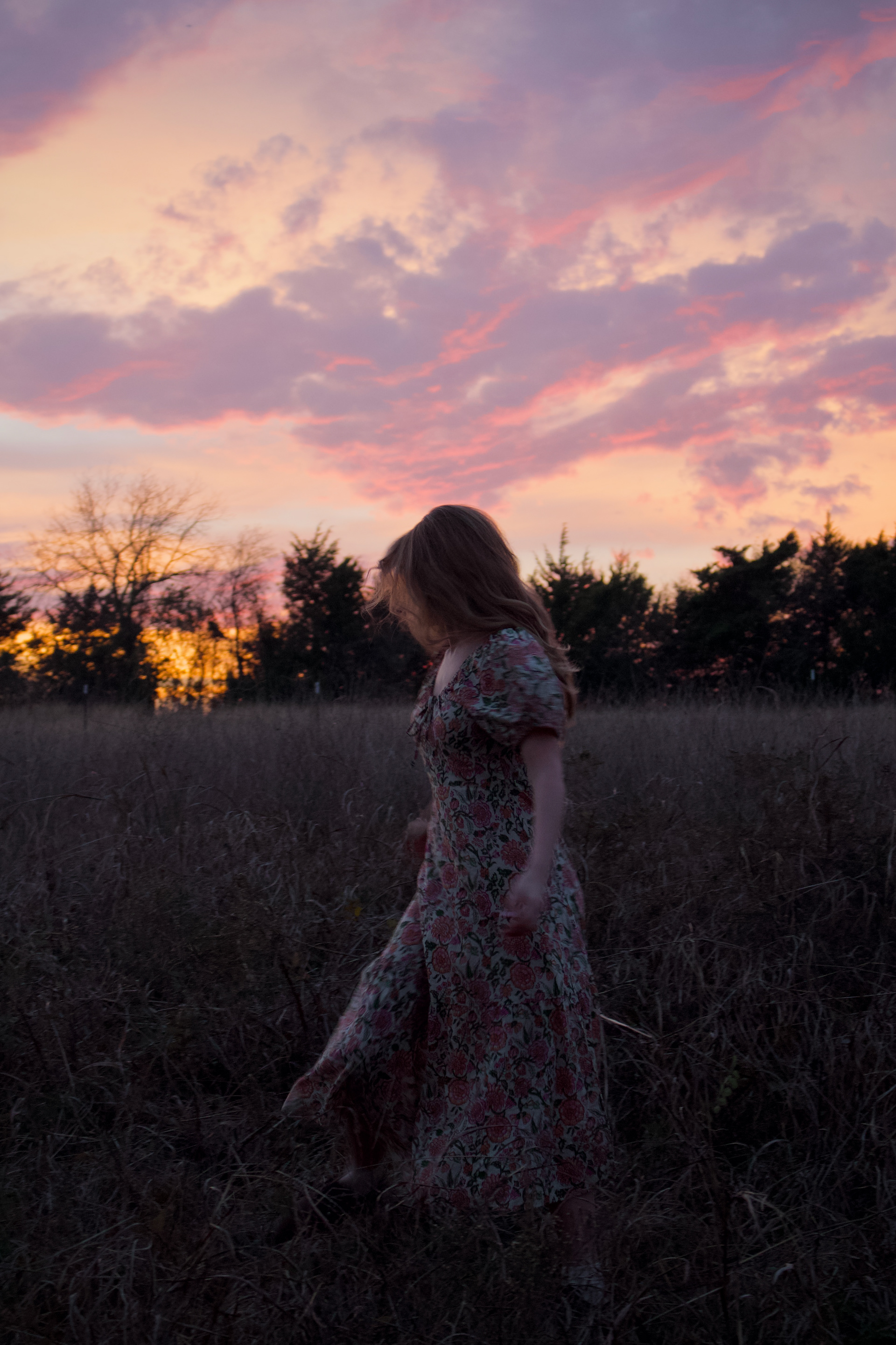 MCKINNEY, TEXAS Dec. 3, 2025 Neve Richmond twirls around in a field of tall grass at a park in McKinney, Texas. Photo/ Natalie VanDerWal
