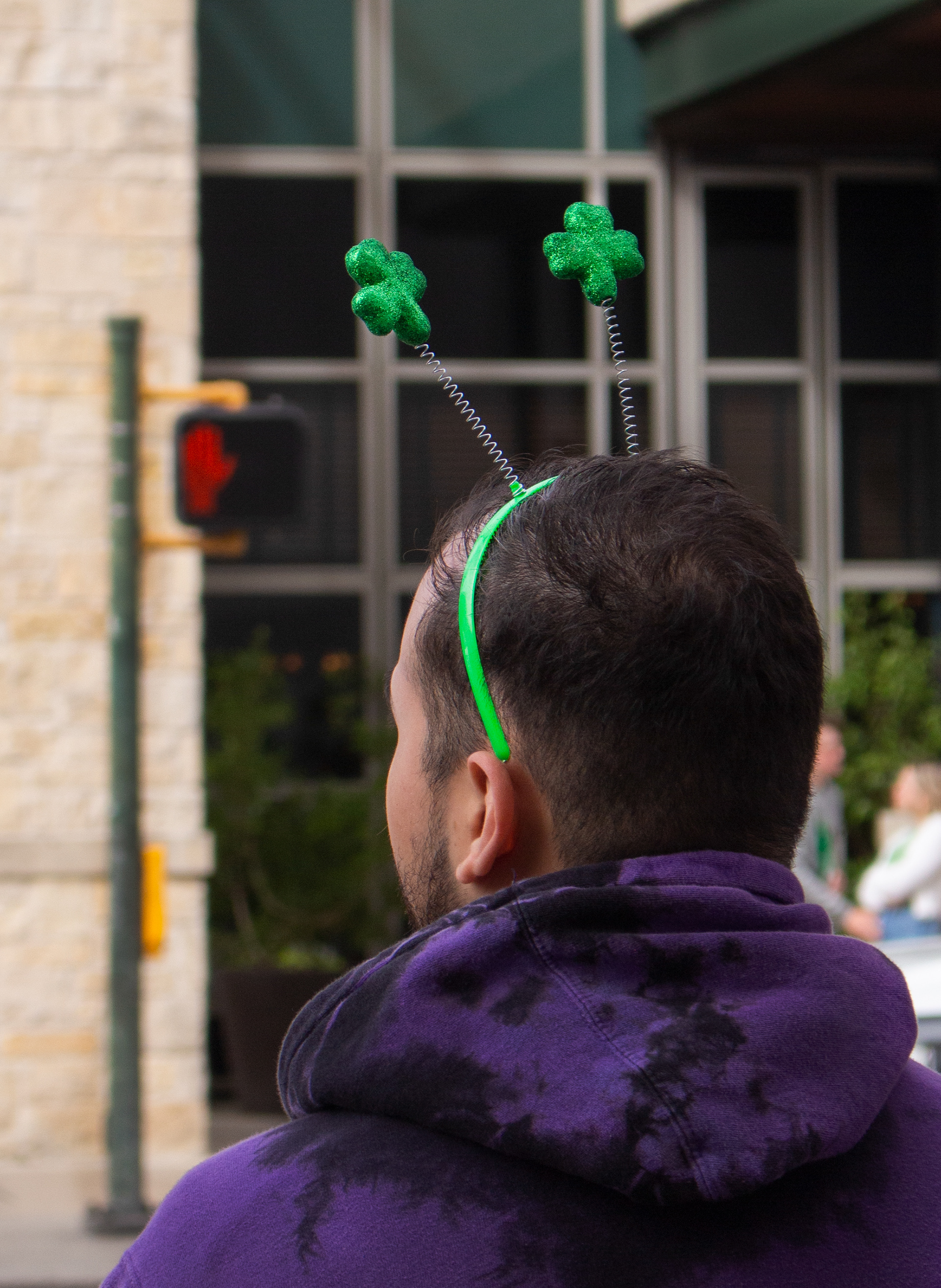 Headband Pedestrian. St. Patrick's Day festival at the San Antonio Riverwalk, San Antonio, Texas. March 17, 2023. Photo/ Natalie VanDerWal
