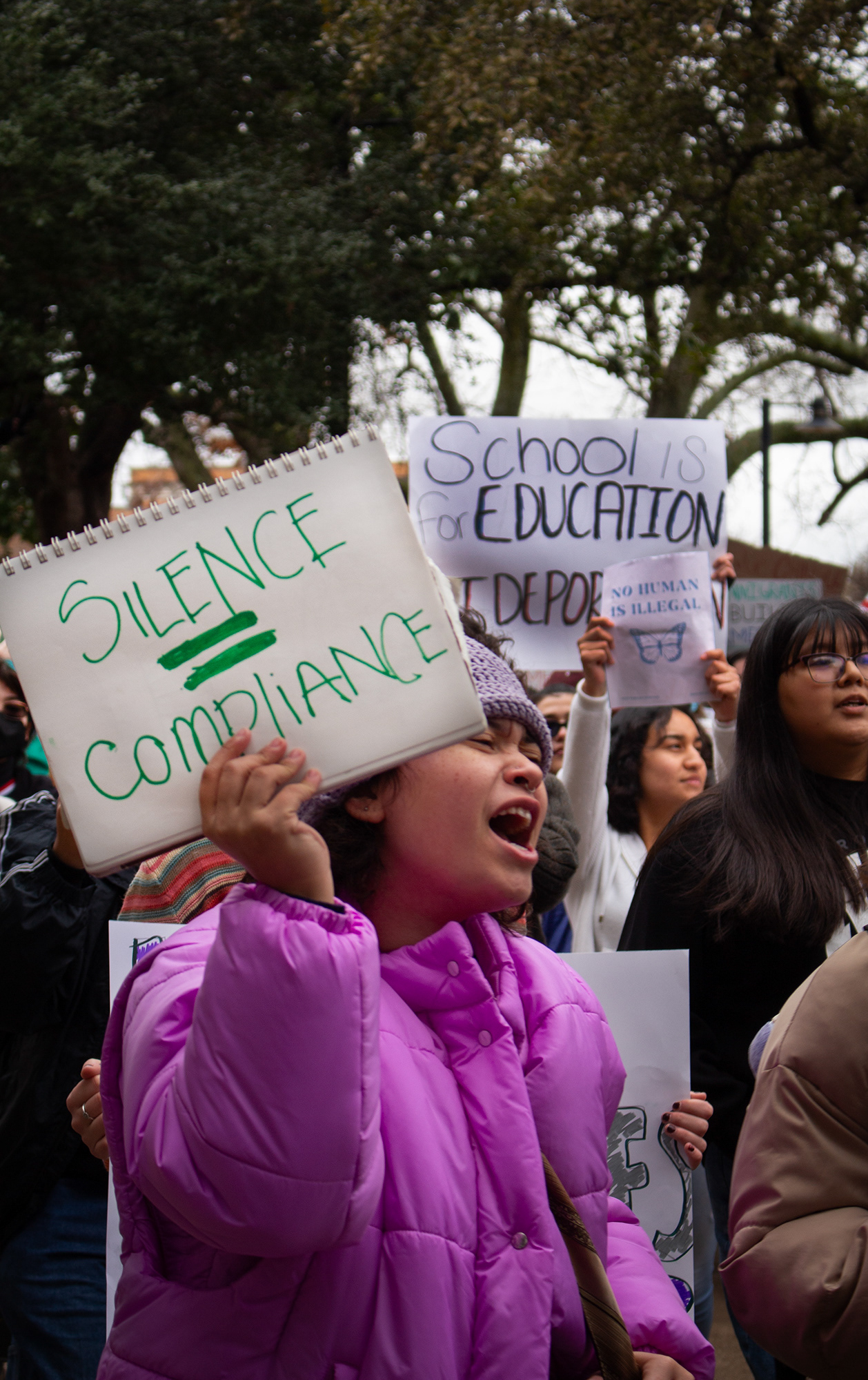 On Wednesday, Feb. 12 at the University of North Texas, students participate in a walk-out protest against suspected ICE presence on campus and in Denton and recent deportations of immigrants into the United States following the inauguration of President Donald Trump. Even if it was a message written hastily in a notebook, those who were passionate about the cause made a noticeable effort to show their support. Photo/ Natalie VanDerWal