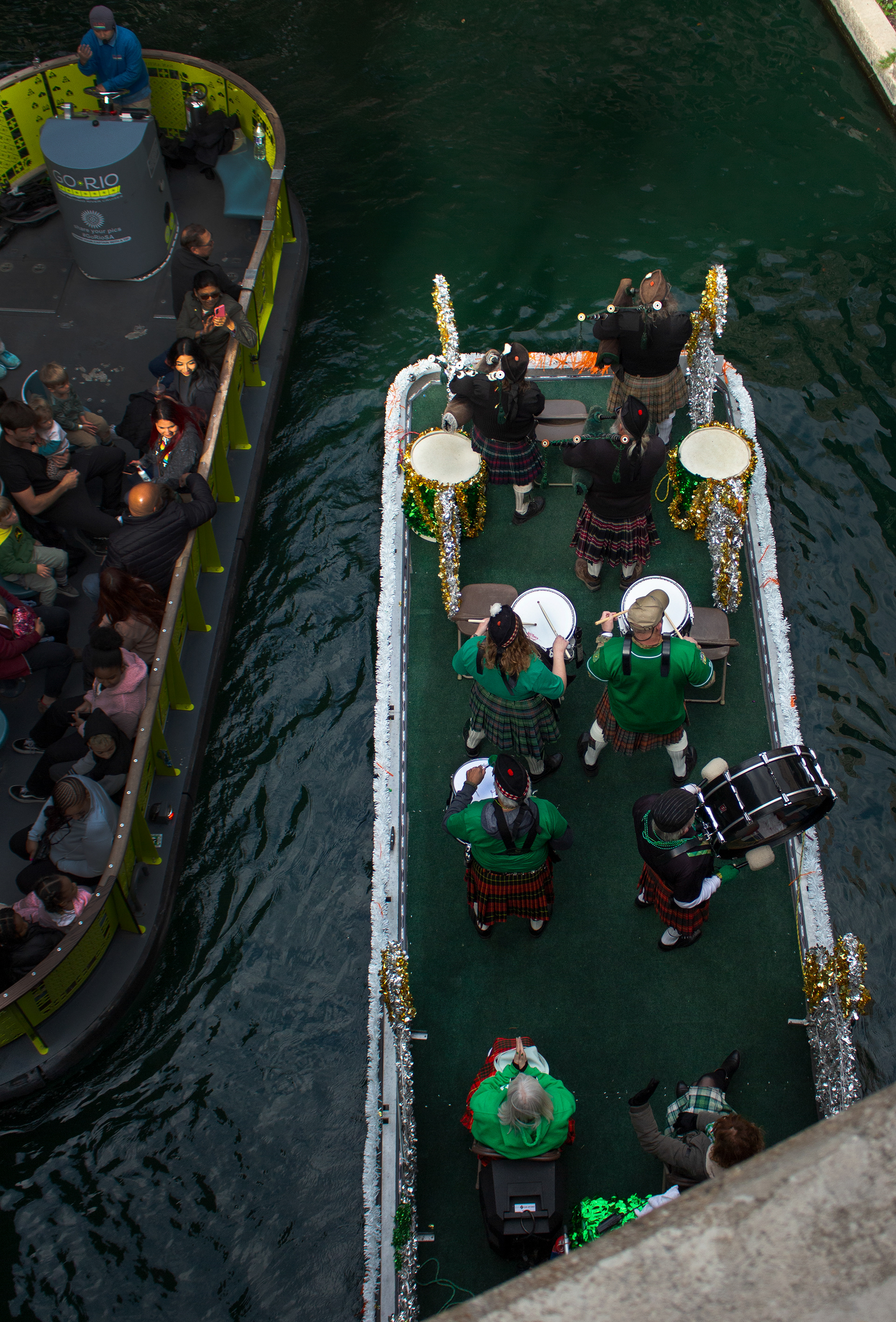 Aerial Drummers. St. Patrick's Day festival at the San Antonio Riverwalk, San Antonio, Texas. March 17, 2023. Photo/ Natalie VanDerWal