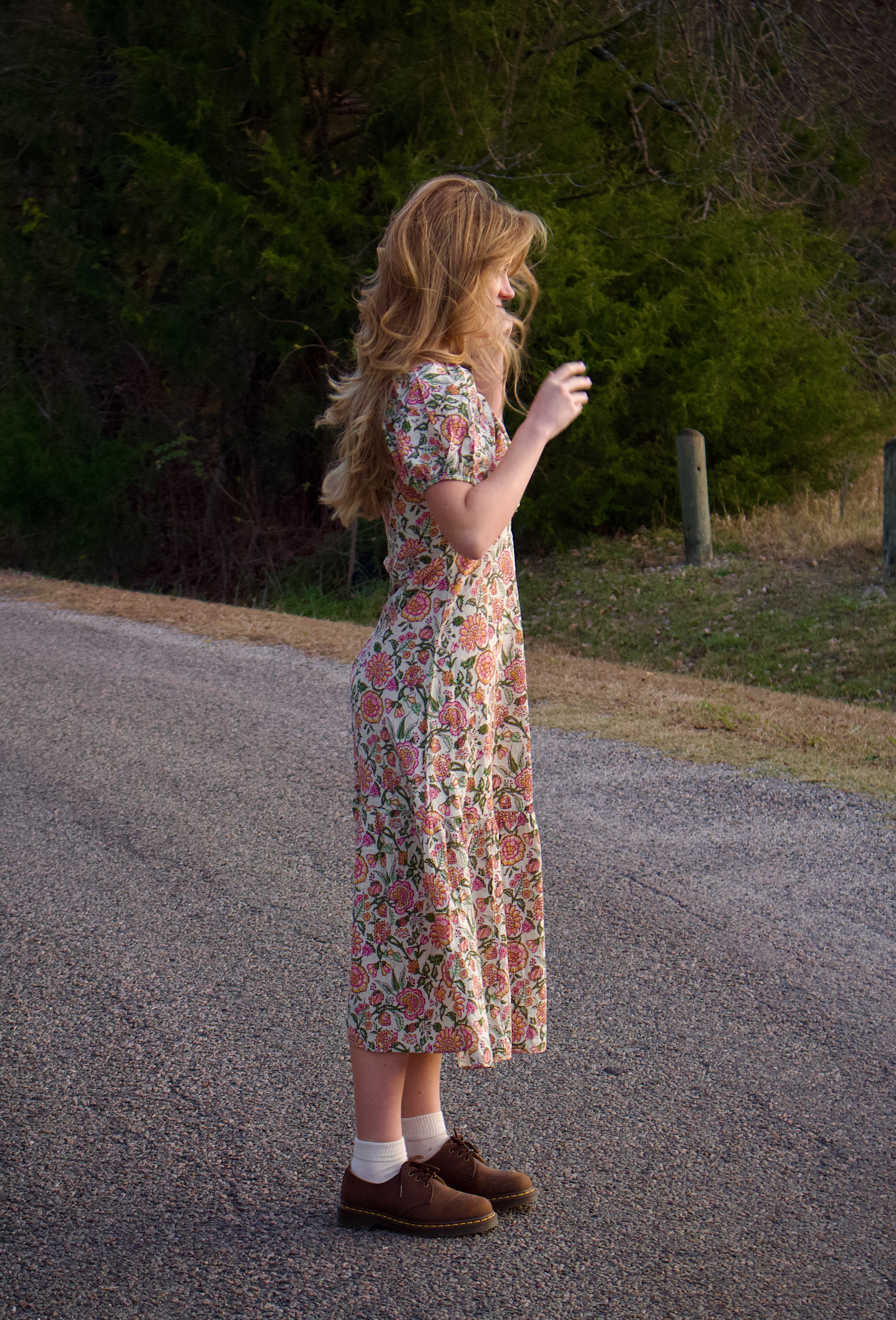 MCKINNEY, TEXAS Dec. 3, 2025 Neve Richmond stands and fixes her hair on a closed road in a park in McKinney, Texas. Photo/ Natalie VanDerWal