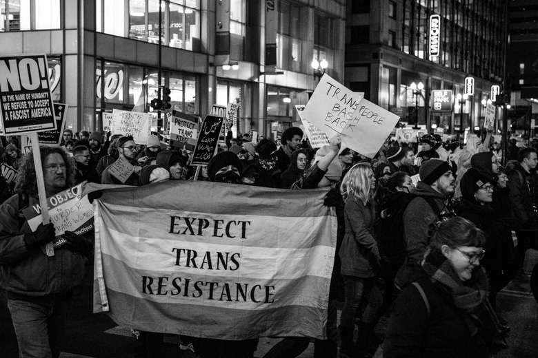 Signs of support along the march of Trans Liberation Protest in downtown Chicago. March 3, 2017. (Photography by Luis Acosta Tejada)