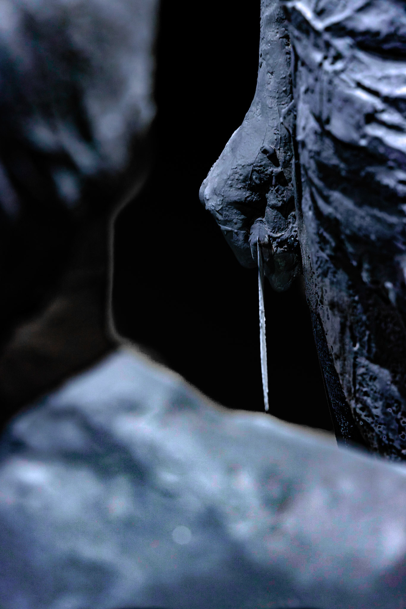 While Abraham holds the knife low, Isaac has offered his neck to the knife.