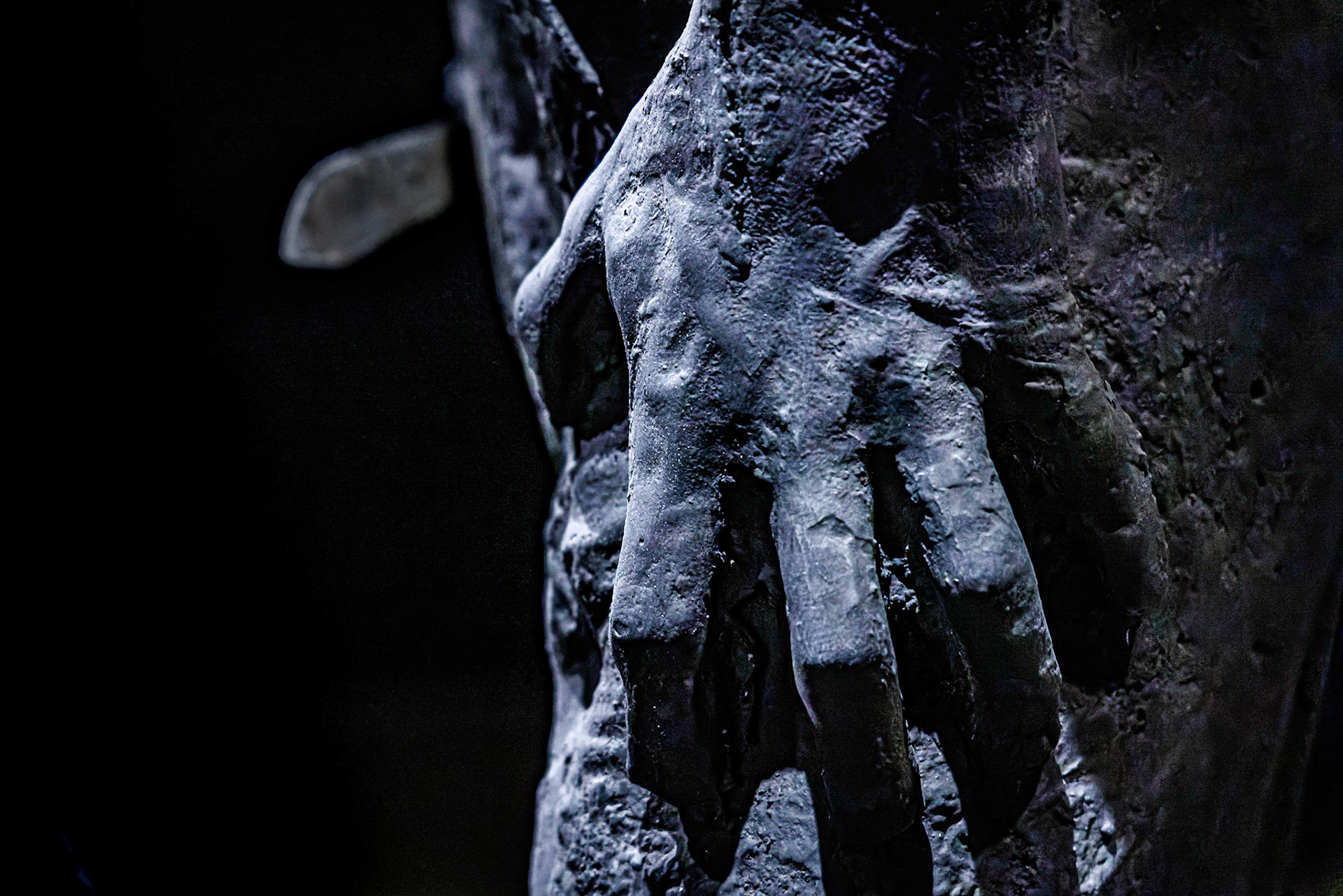 While Abraham appears calm, the digging of his fingernails into his leg demonstrates his angush in the act he is about to commit.