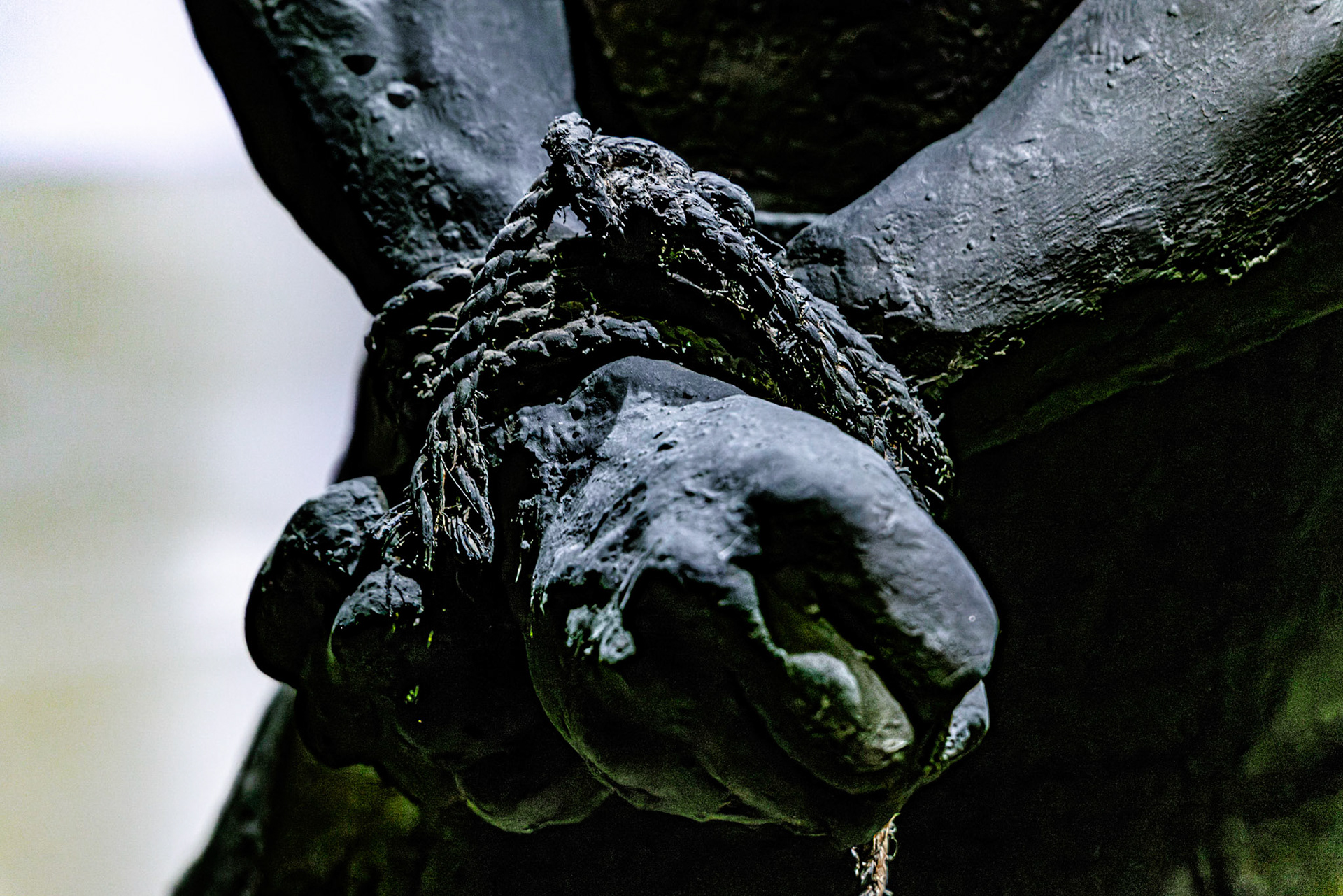 While Isaac's hands are bound, he still makes no effort to protect himself from the thrust of the knife. His faith is strong enought to do what G-d wants unquestioningly.