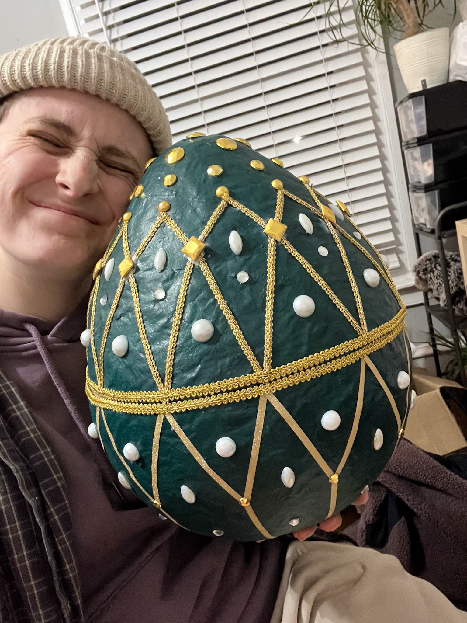 Nool costuming was Victorian inspired, so I designed the egg in the faberge style. It "hatches" by opening up like a faberge egg.