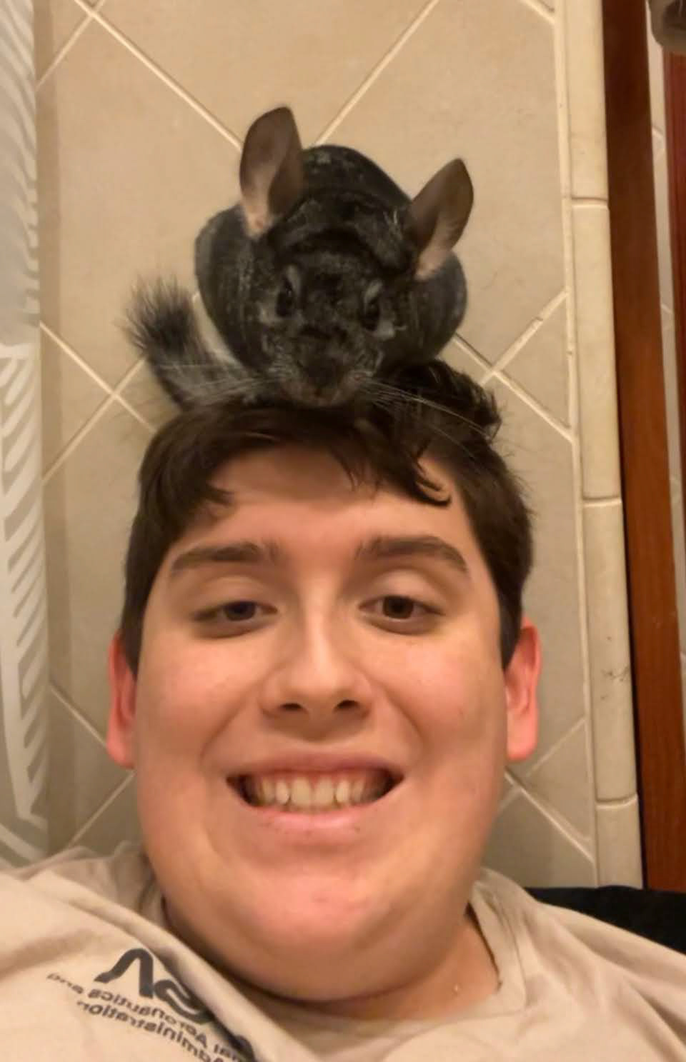 Carlos and his fluffy chichilla, Puff