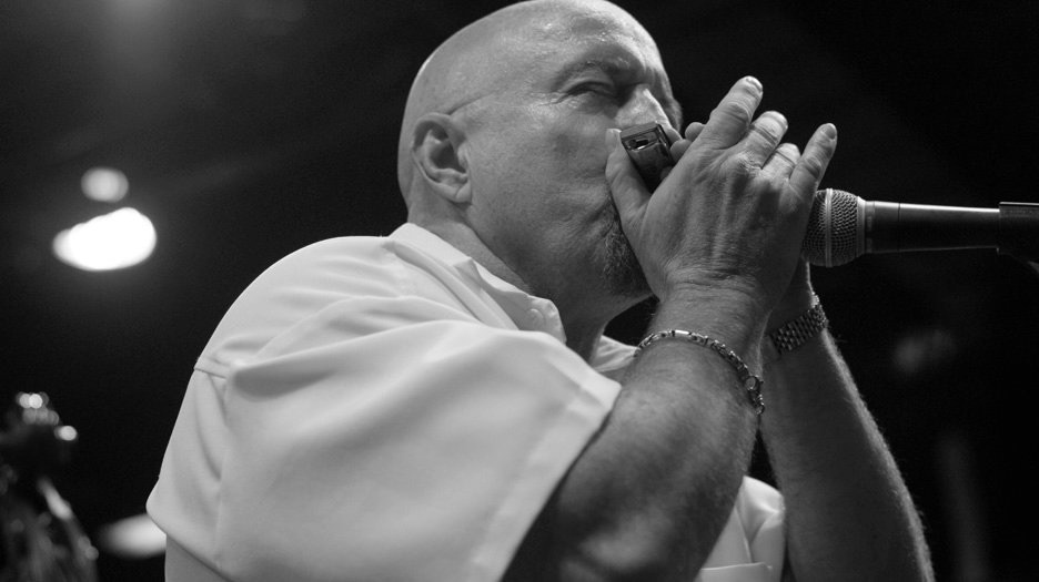 Kim Wilson and the Fabulous Thunderbirds performing at the Hohner NAMM booth