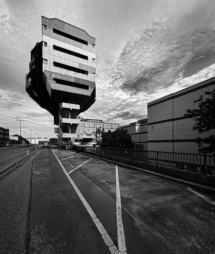 Black and white photograph of a road and Bierpinsel - Steglitz - Berlin - Germany