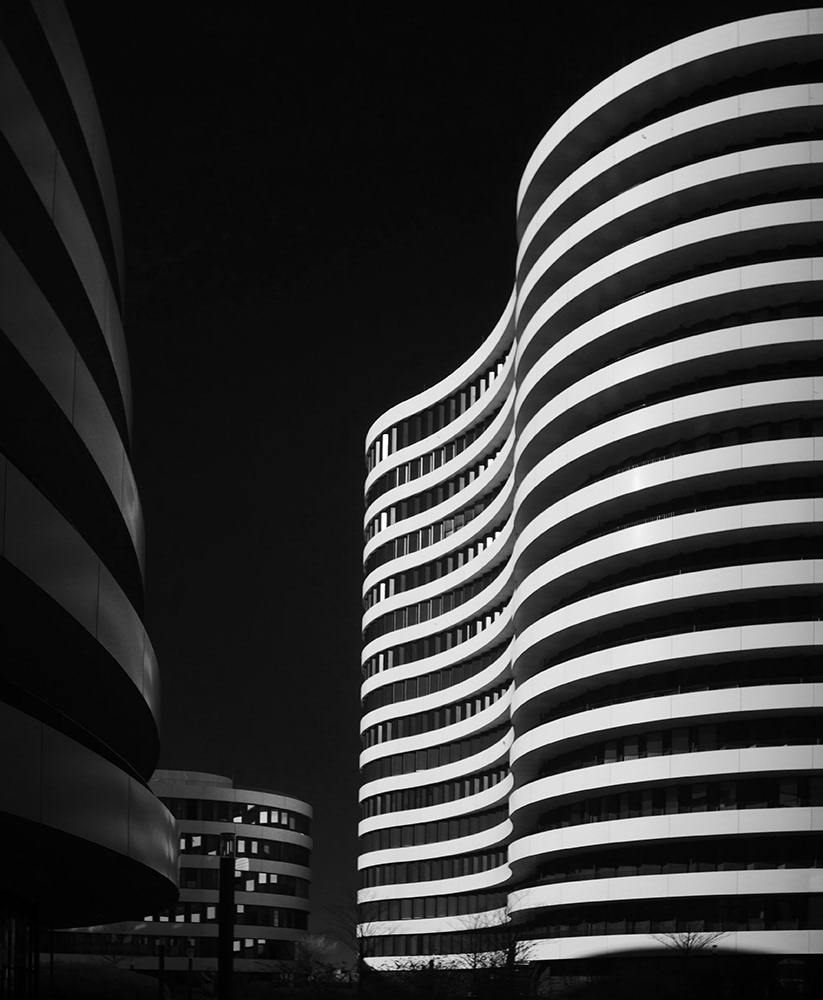 Black and white infrared photograph of the Trivago building in Dusseldorf Harbour.