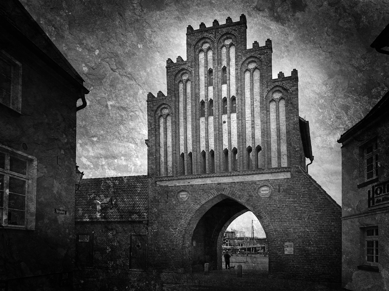 Black and white photograph by Mark Robert Davey showing a water gate in Wismar.