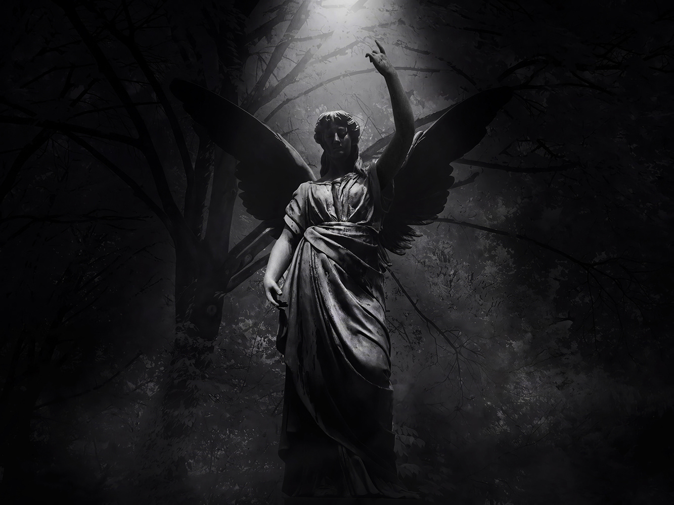 Black and white photograph of an Angel — Melatenfriedhof - Cologne - Germany