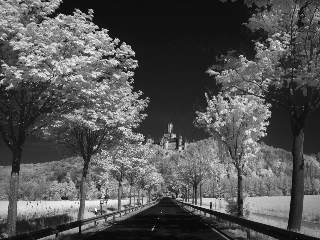 Black and white infrared photograph of the The Entrance to Schloss Marienburg Castle - Germany