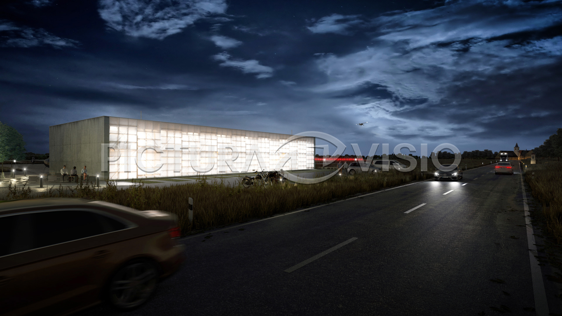 Fotorealistická 3D vizualizace letištního hangáru v Jihomoravském kraji s prosvětlenou polykarbonátovou fasádou a dřevěným nosným roštem, zachycená v noci s pohledem na okresní silnici.