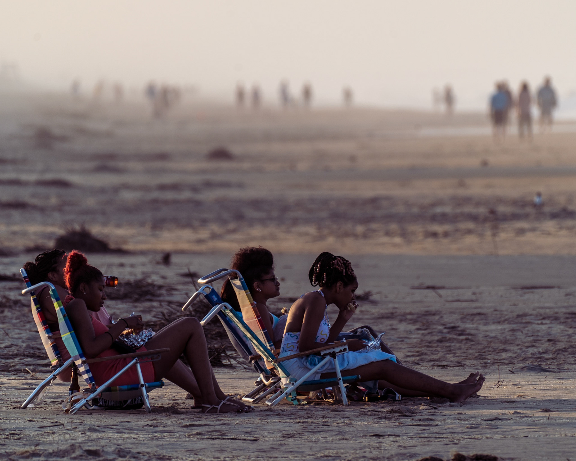 I was hoping to photography a supermoon rising above the pier, but the moon was invisible behind the clouds. I turned around and saw this scene.