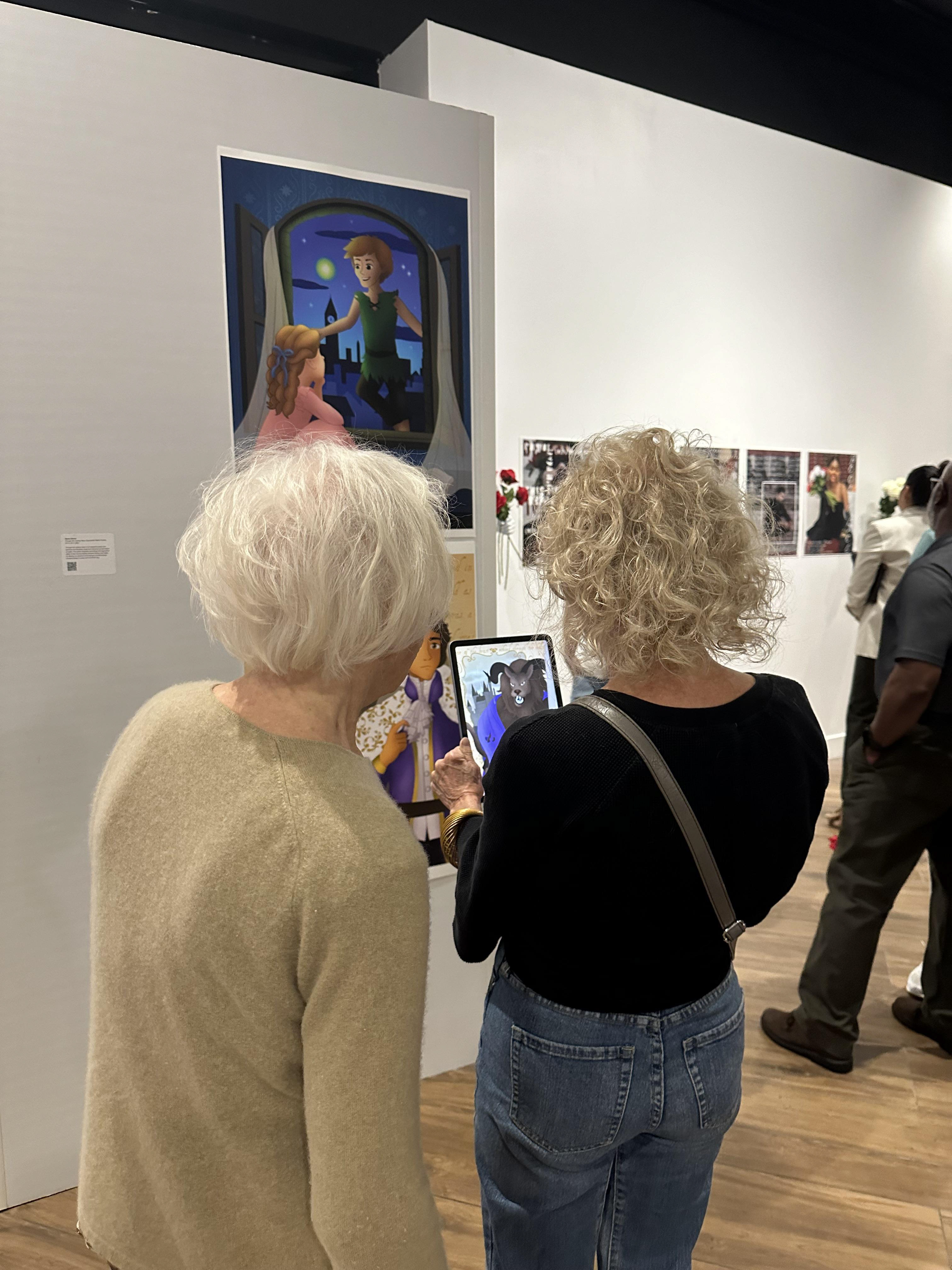 Visitors interacting with the series and exploring the augmented layers.