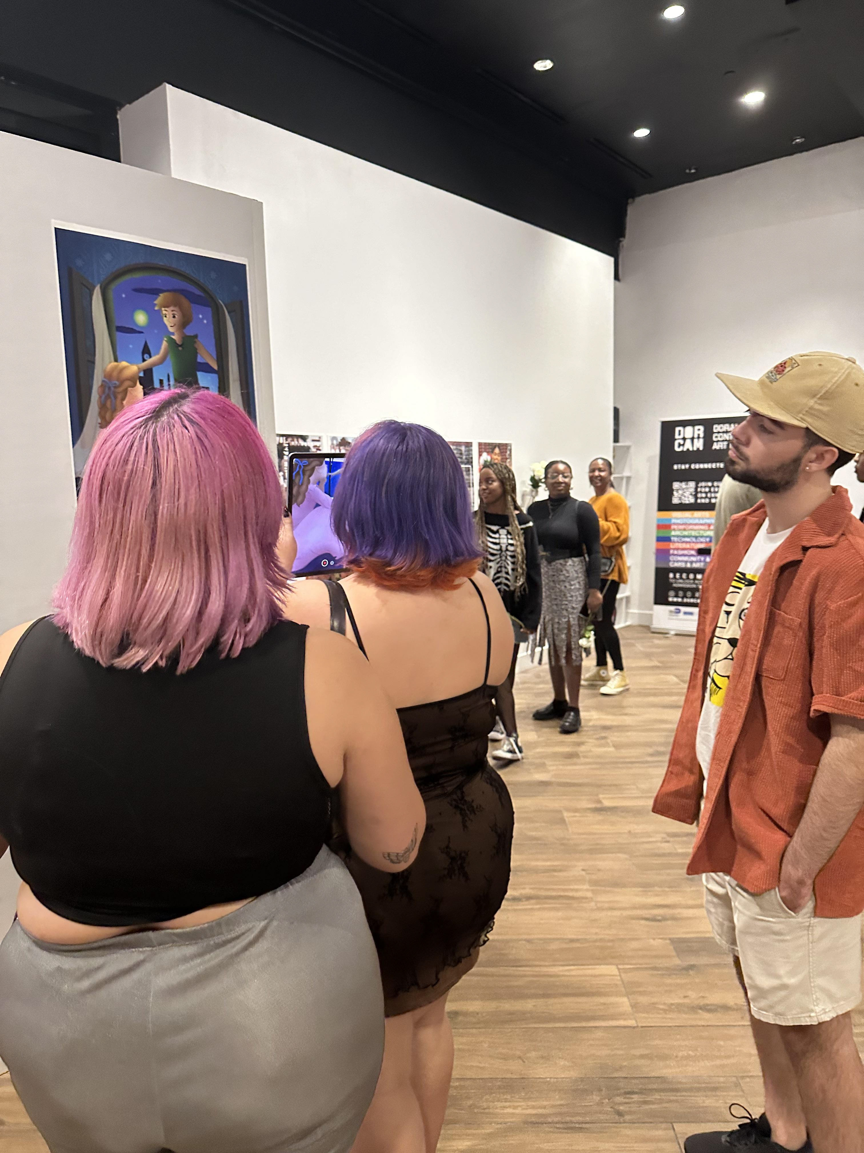 Visitors interacting with the series and exploring the augmented layers.